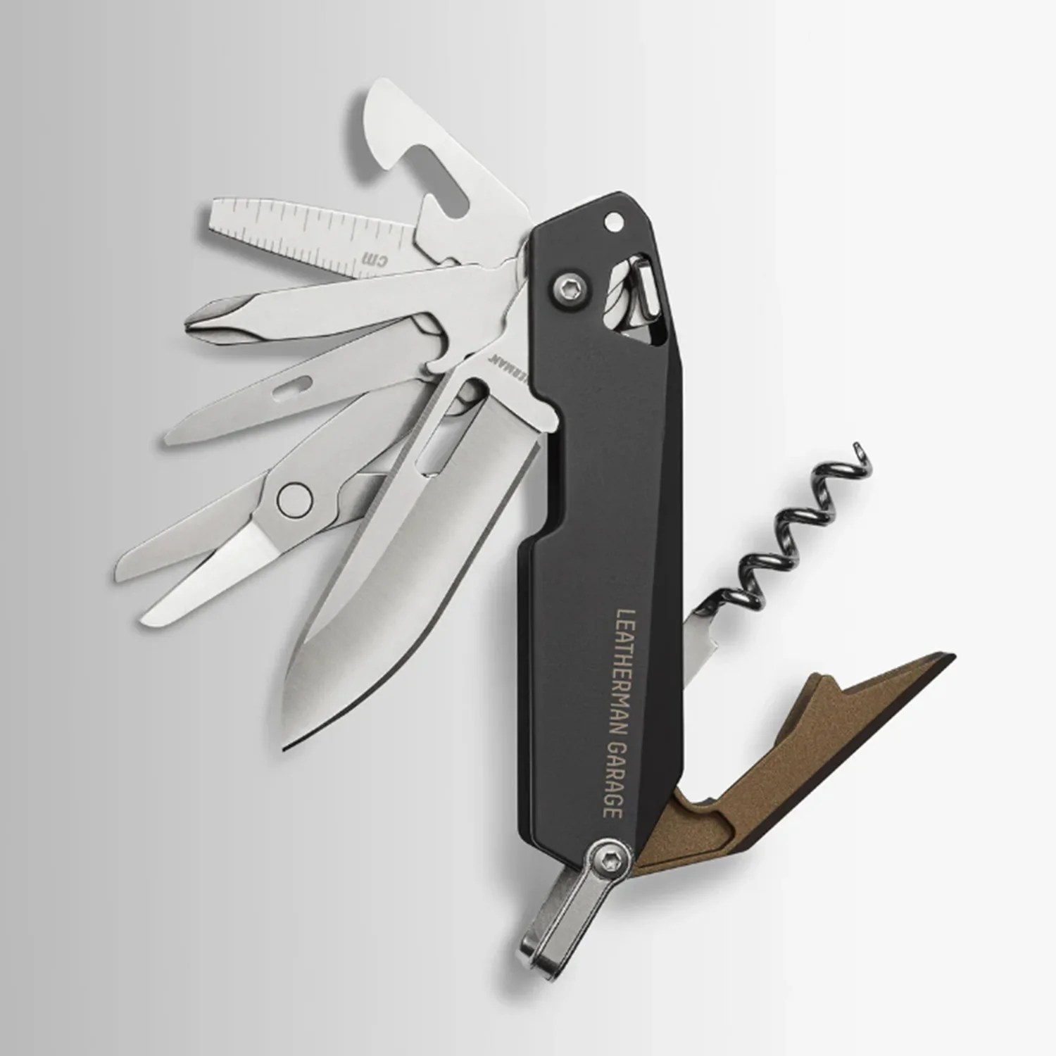Black and bronze Leatherman Garage multi-tool with various stainless steel tools extended.