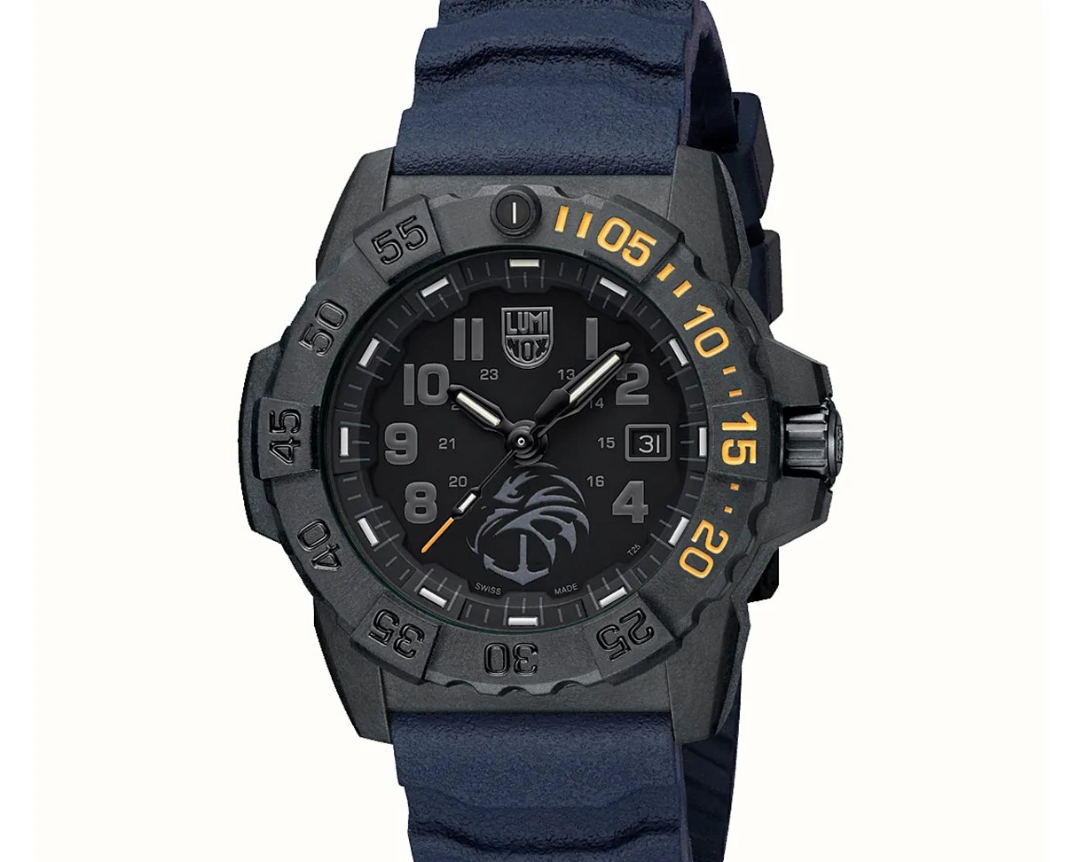 Black Luminox wristwatch with a textured black bezel featuring yellow numerals and a blue strap.