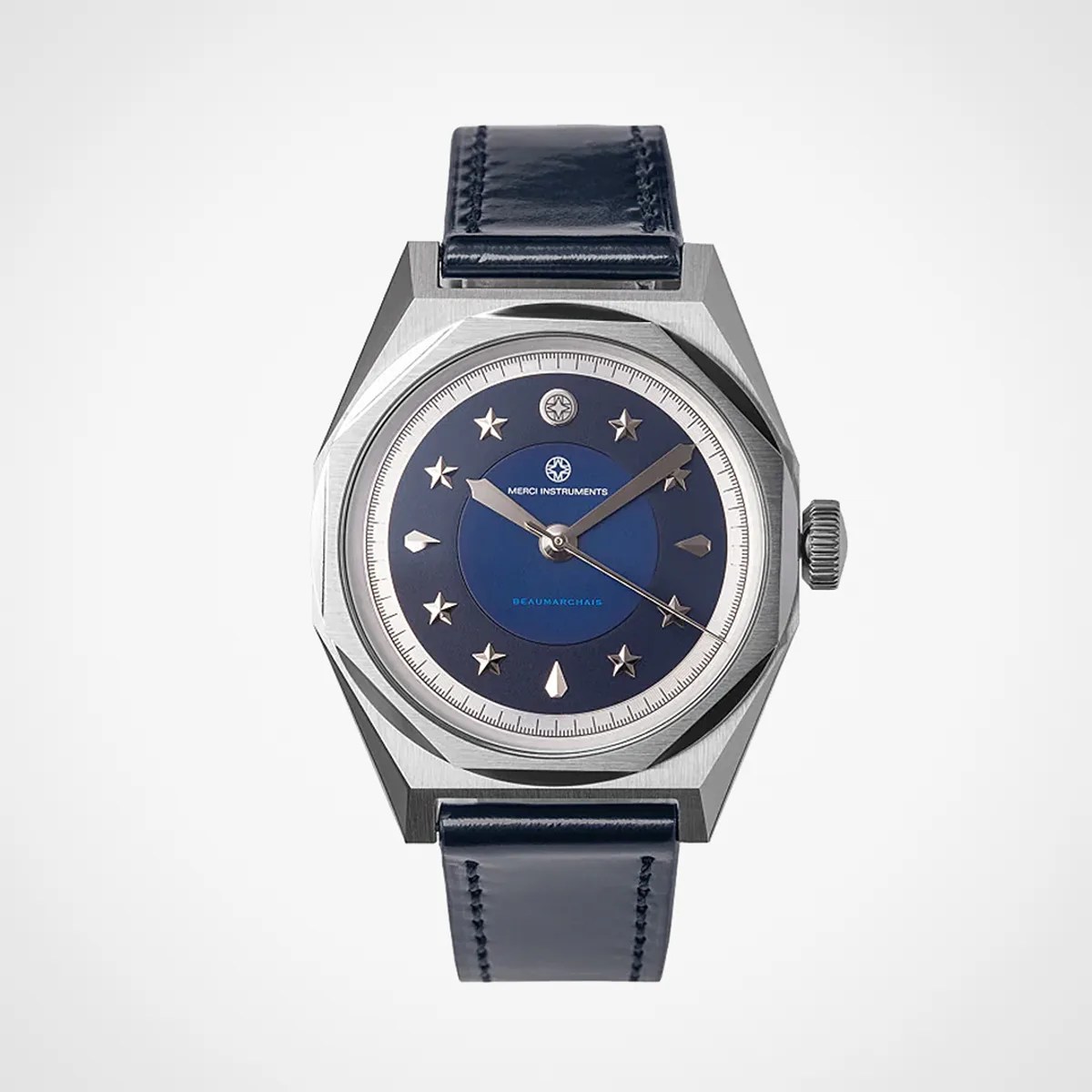Silver octagonal watch with a blue dial featuring star-shaped hour markers and a matching blue leather strap.
