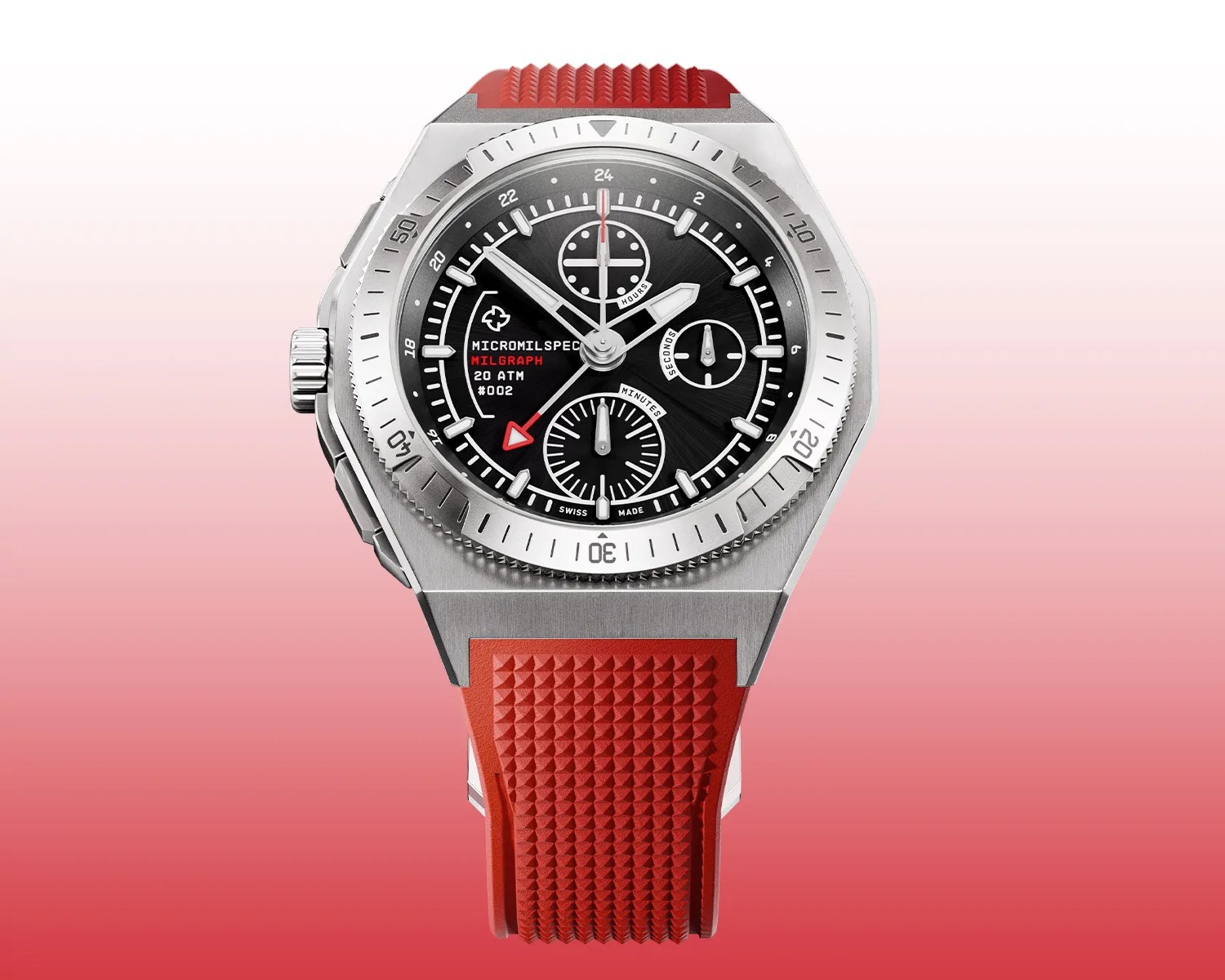 titanium watch with black dial, red arrow hand, and textured red rubber strap on gradient red background.