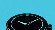 Black round watch face with glowing turquoise hour and minute hands and markers on a turquoise background.
