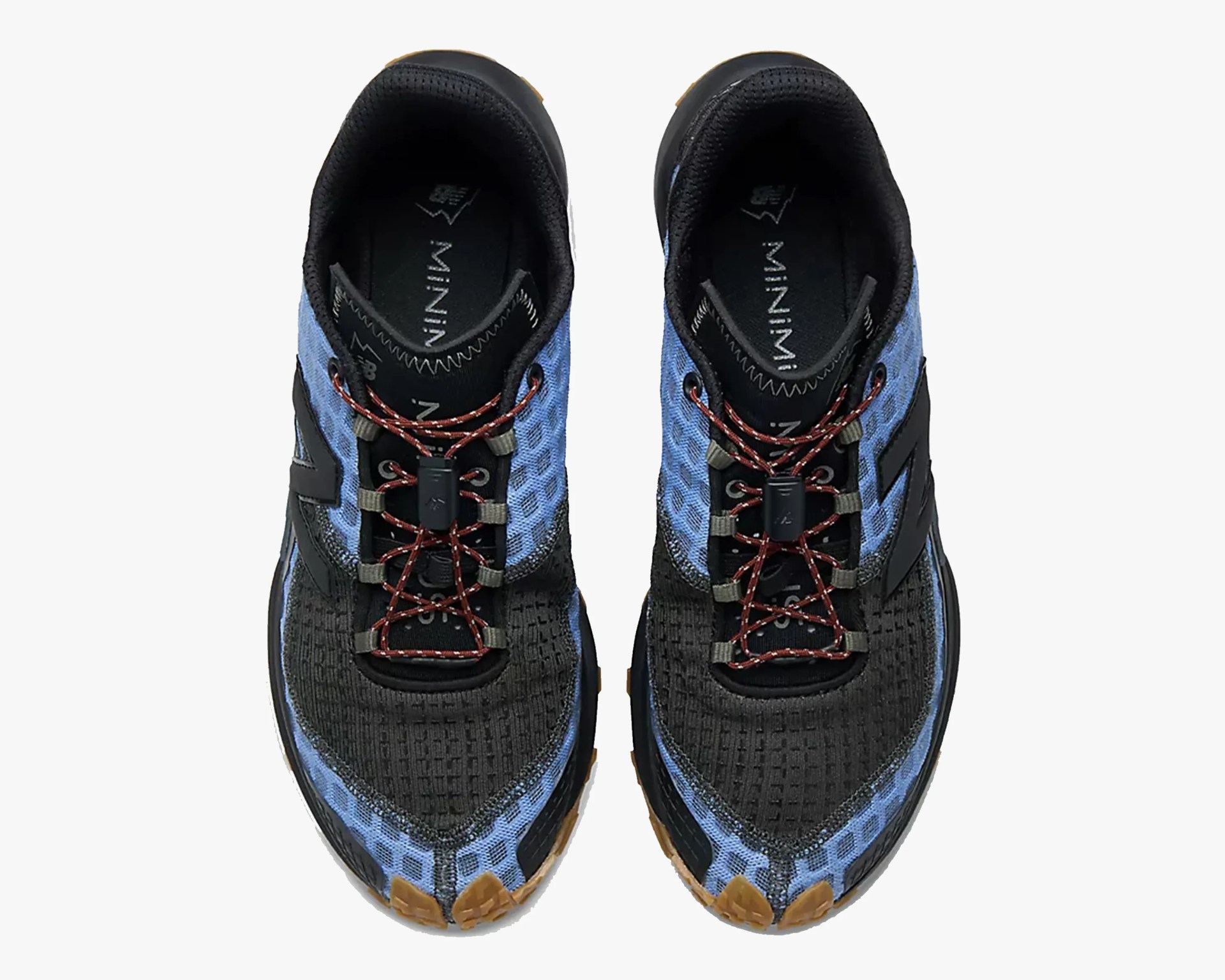 Pair of black and blue New Balance running shoes with brown laces and gum soles, viewed from above.