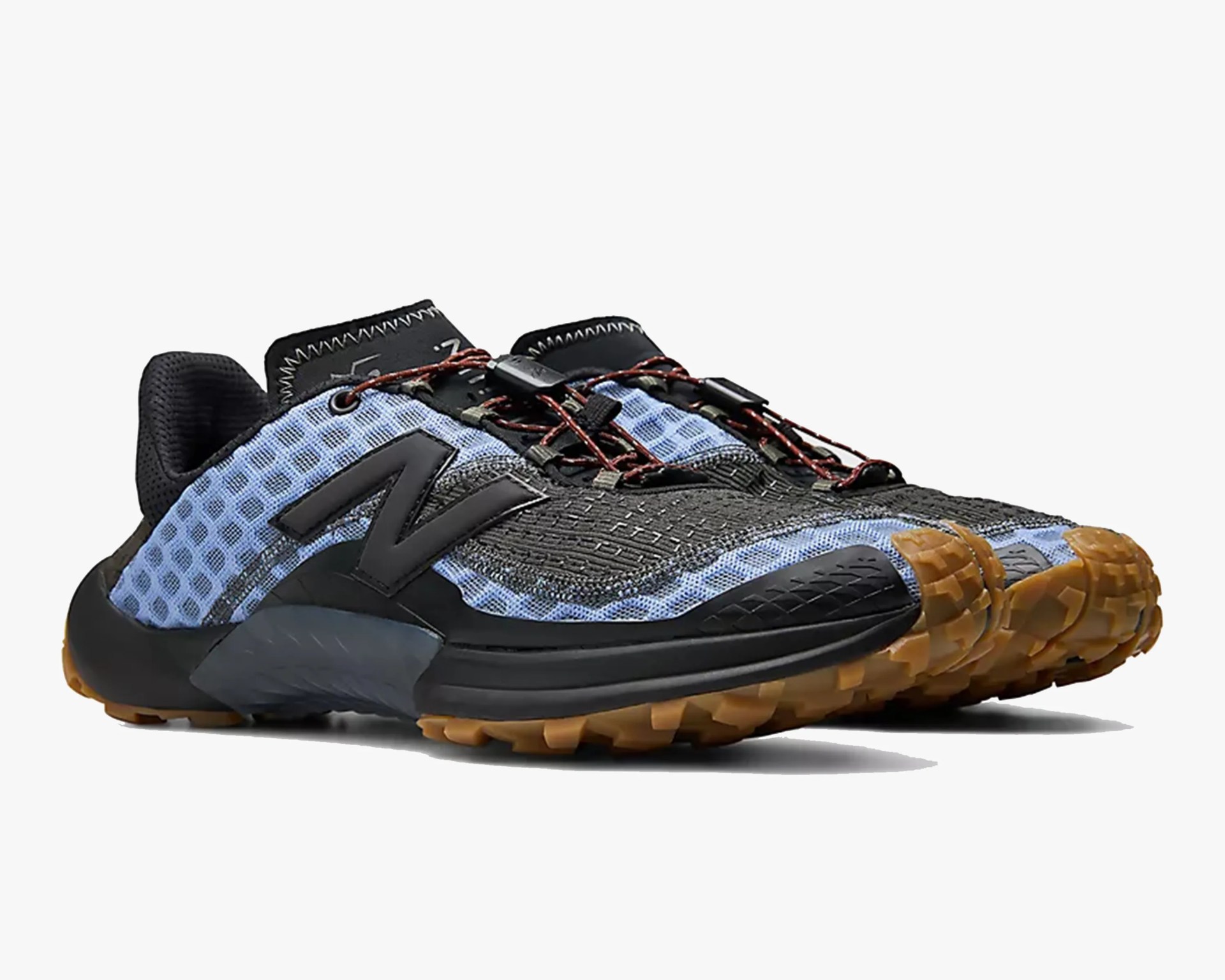 Pair of black and blue New Balance trail running shoes with gum rubber soles and red laces.
