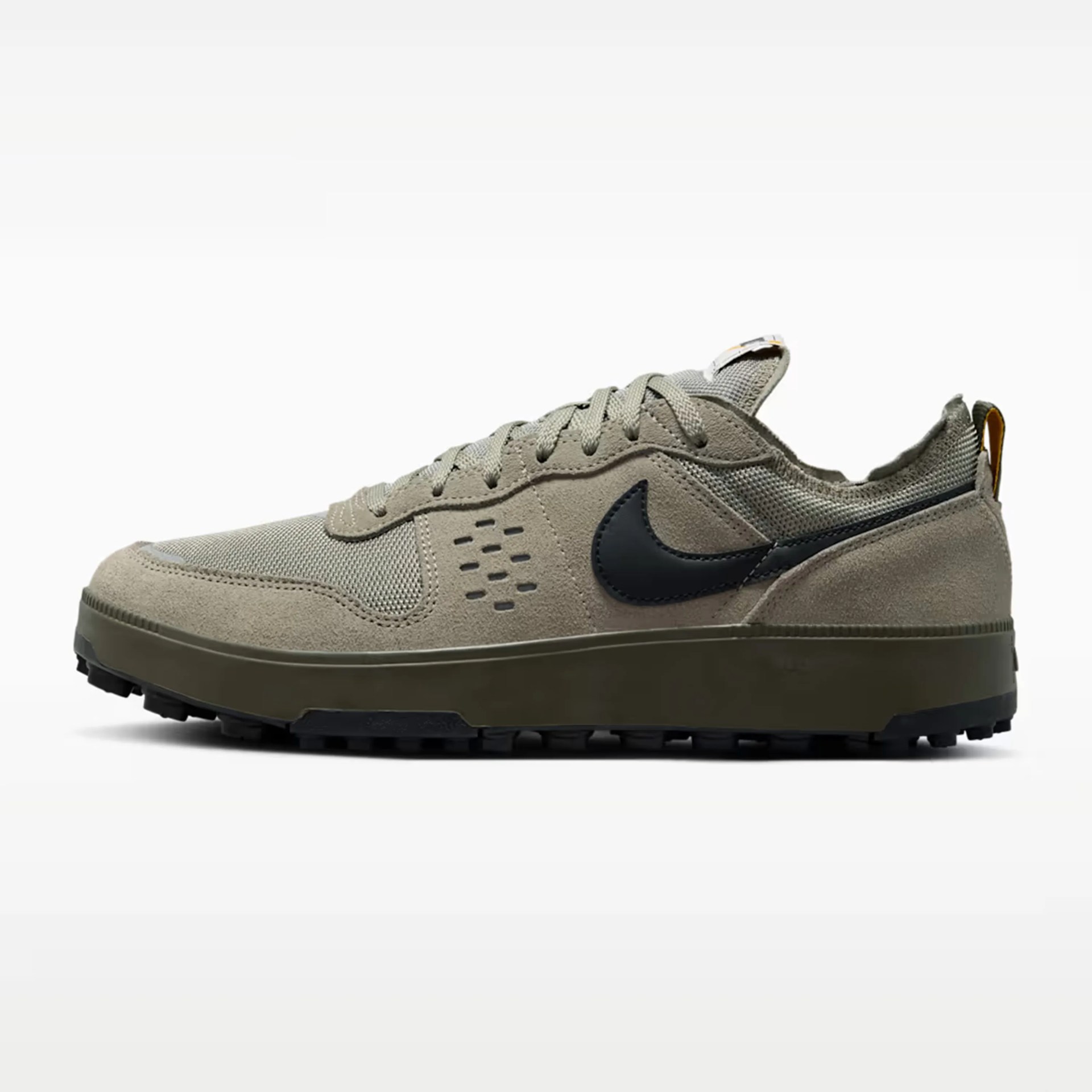Olive green Nike sneaker with black swoosh logo and textured sole, side view.