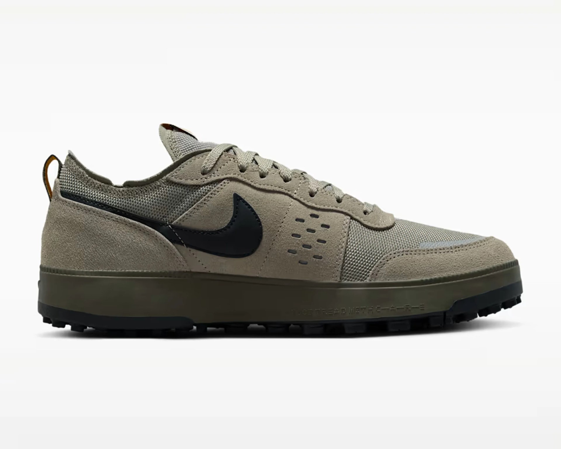 Beige and olive green Nike sneaker with black swoosh logo and mesh and suede upper.