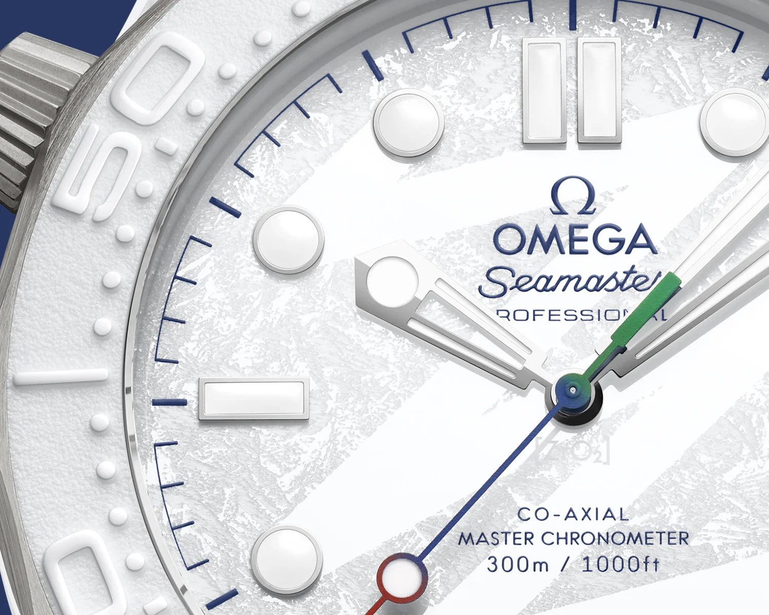 Close-up of white Omega Seamaster Professional watch face with silver hands, blue second hand, and textured dial.
