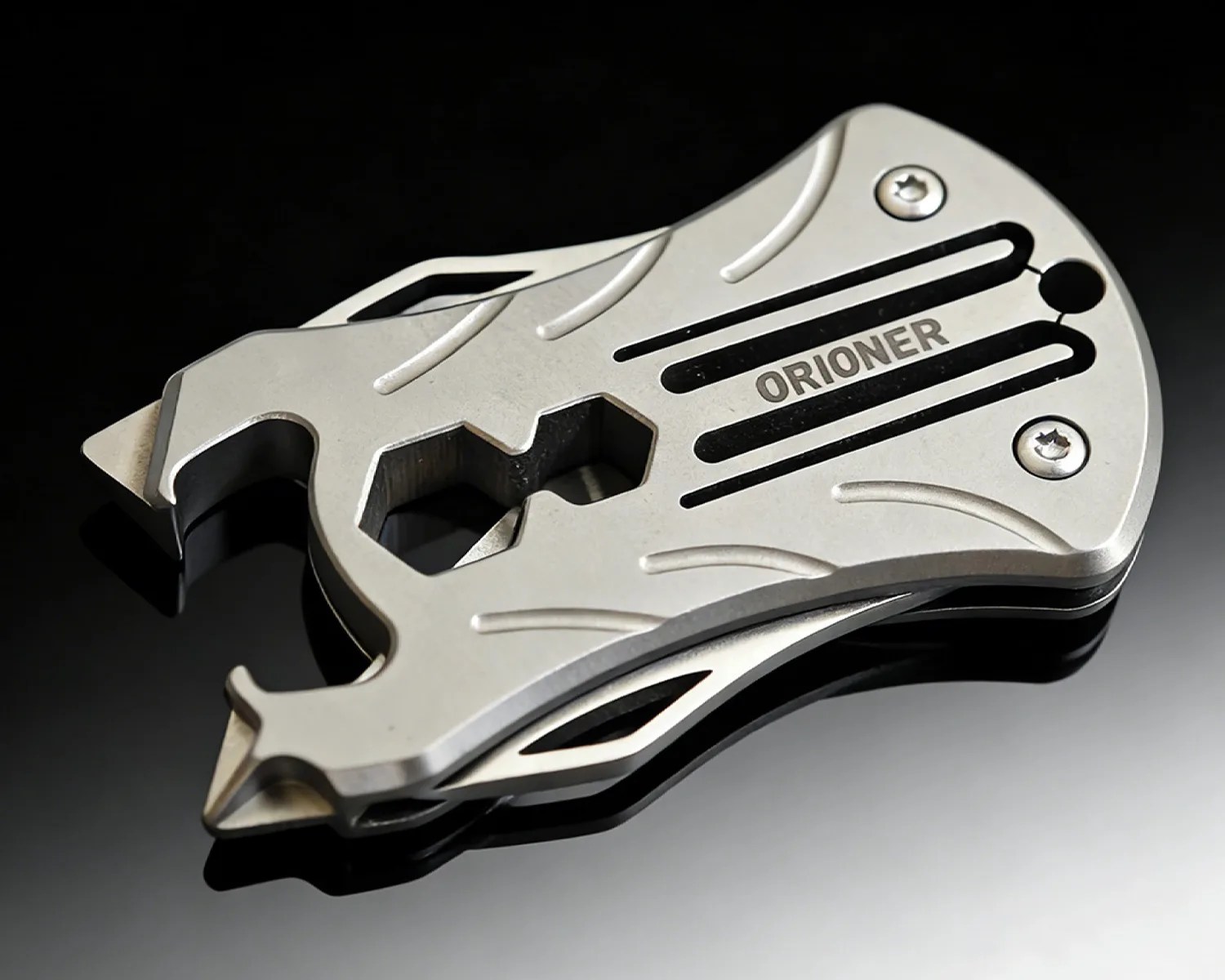 Compact silver multi-tool with hex wrench, bottle opener, and blade, branded "ORIONER" on a black surface.