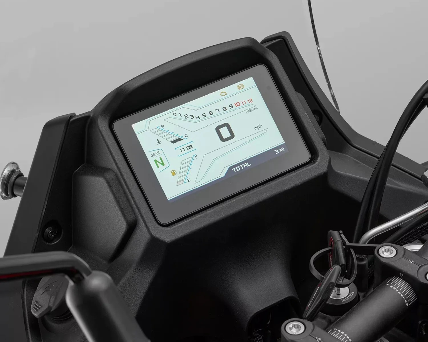 Digital motorcycle dashboard display showing neutral gear, speedometer at zero, fuel gauge, and odometer reading 3 miles.