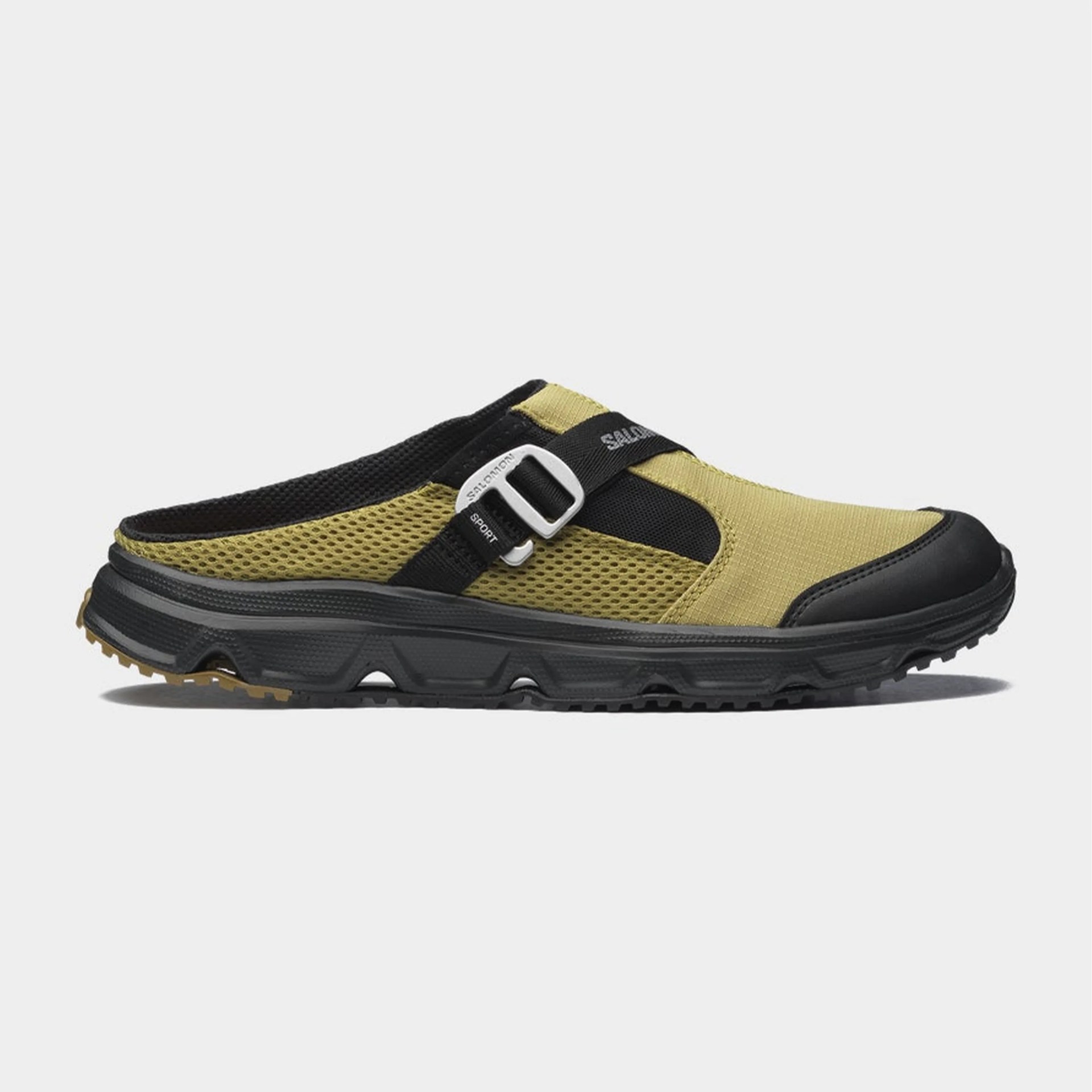 Olive green and black slip-on sandal with mesh upper and adjustable strap on black sole.
