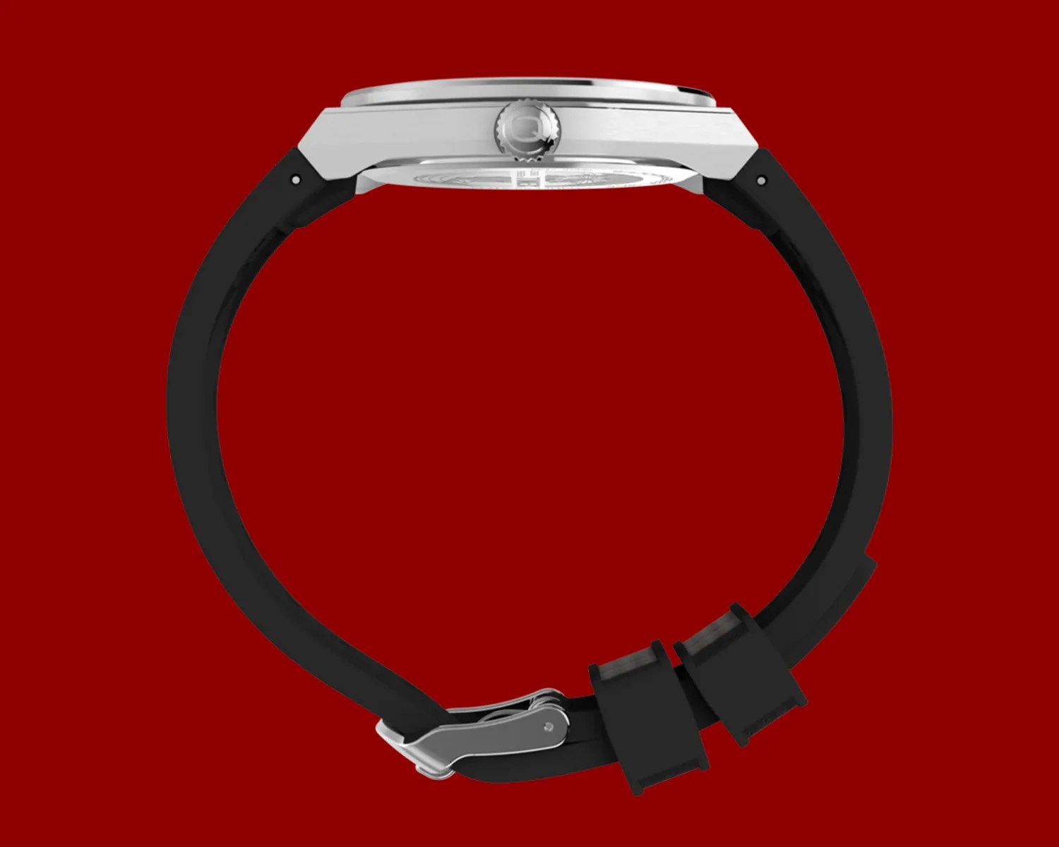 Side view of a silver watch case with a black rubber strap and a metal clasp on a red background.