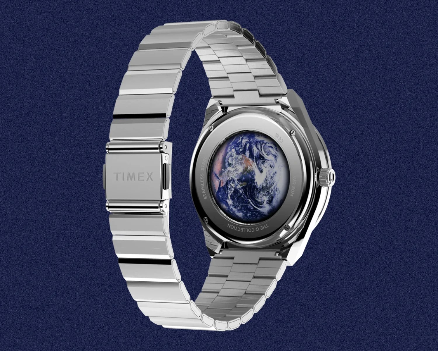 Silver stainless steel Timex watch with Earth image on the back case against a dark blue background.