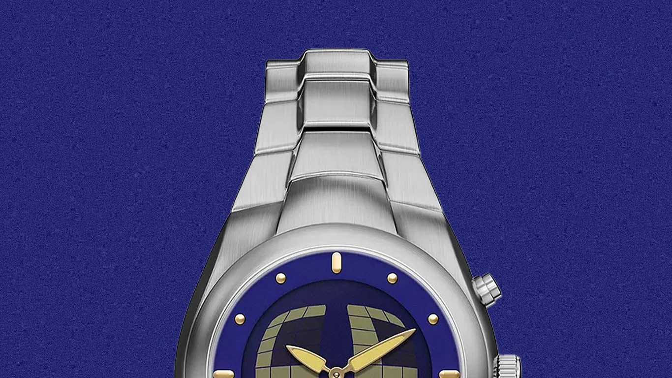 Silver metal wristwatch with a blue dial and gold hour markers and hands on a blue background.
