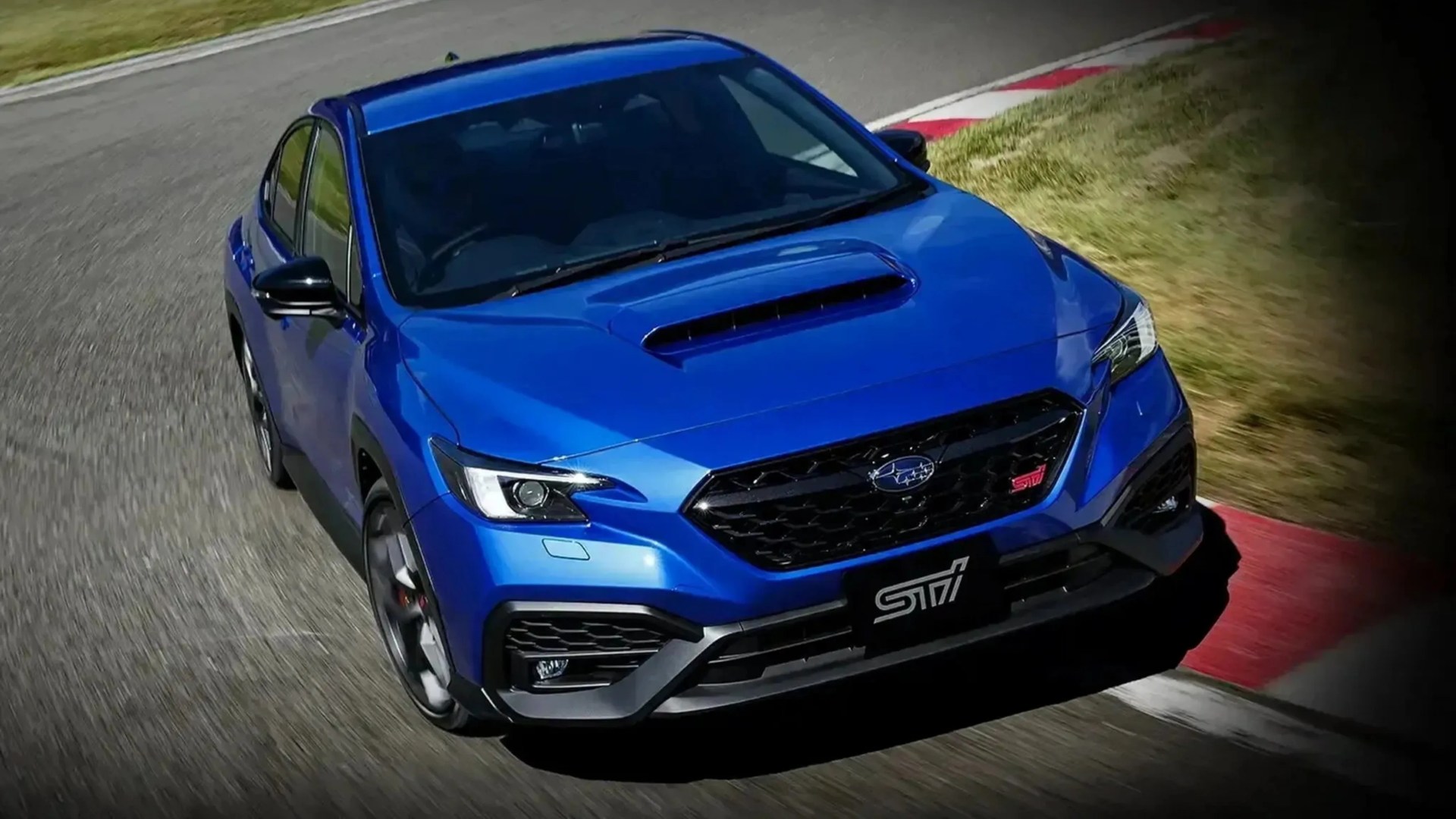 Blue Subaru WRX STI sedan with hood scoop driving on a racetrack corner.