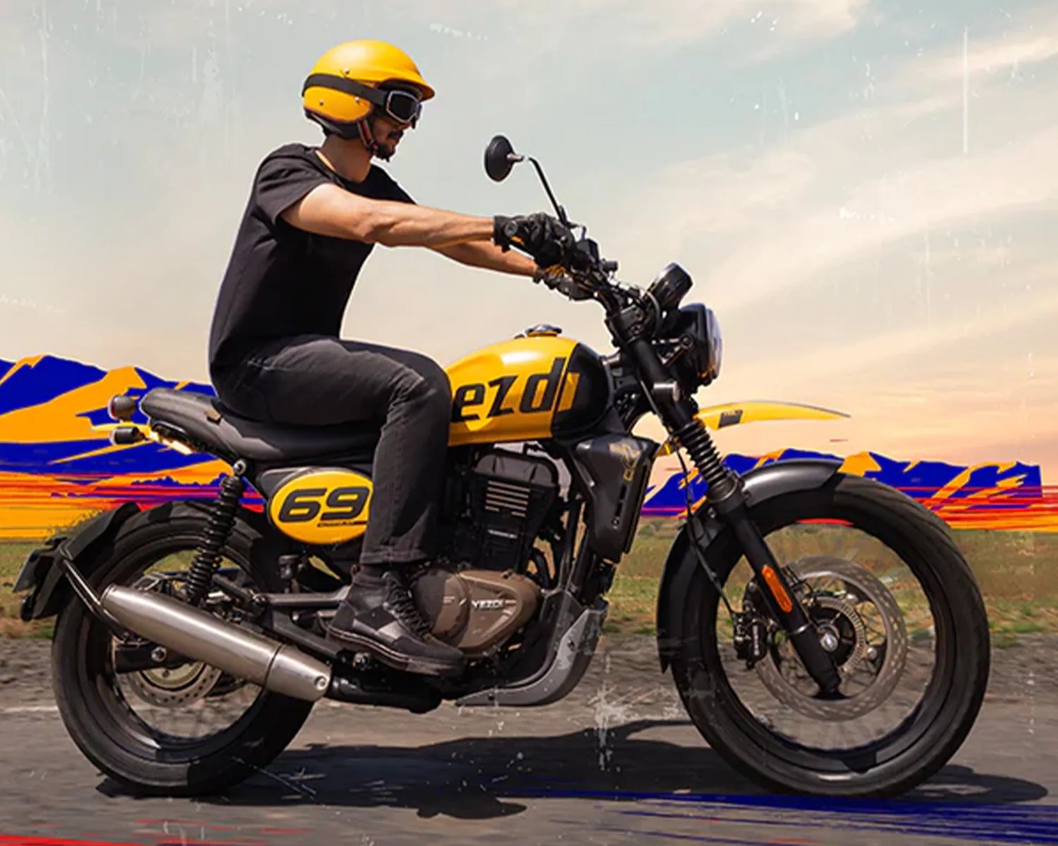 Man wearing a yellow helmet riding a yellow and black motorcycle with "69" on the side panel.