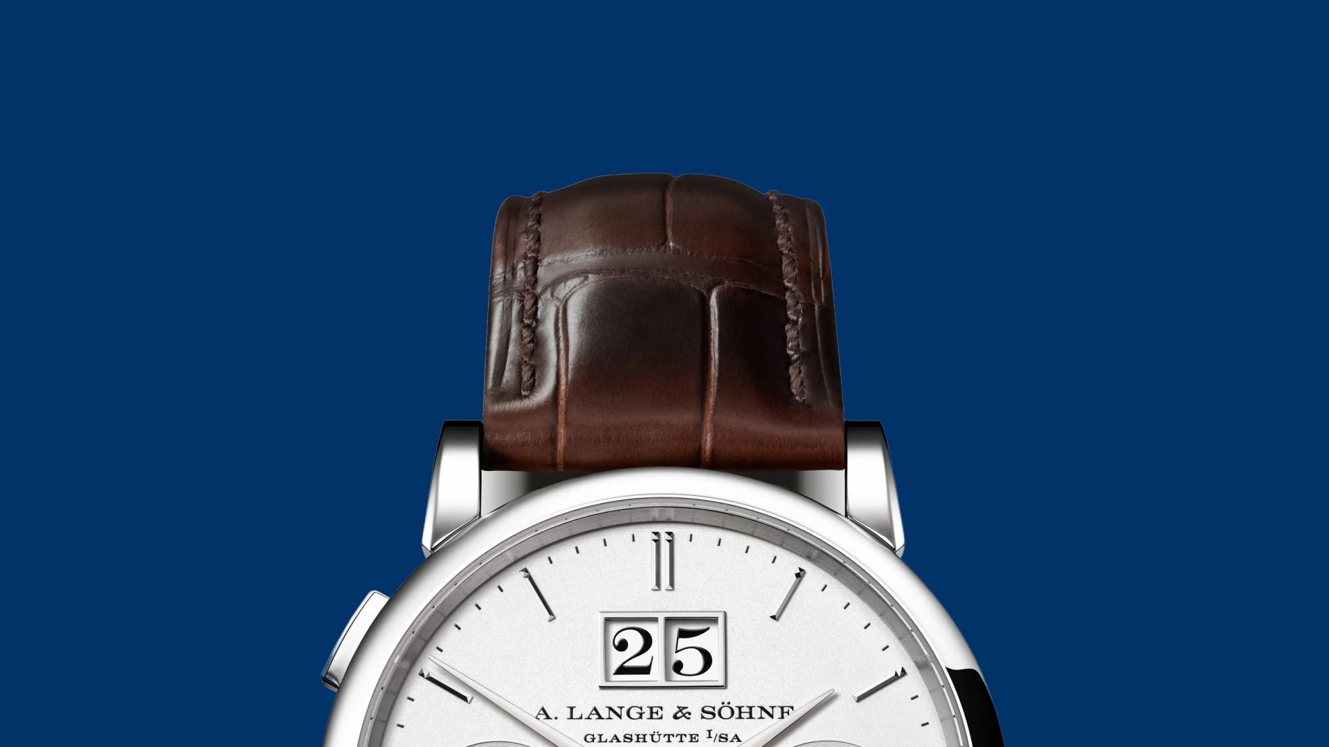 Silver A. Lange & Söhne wristwatch with white dial, black numerals, and brown leather strap on blue background.