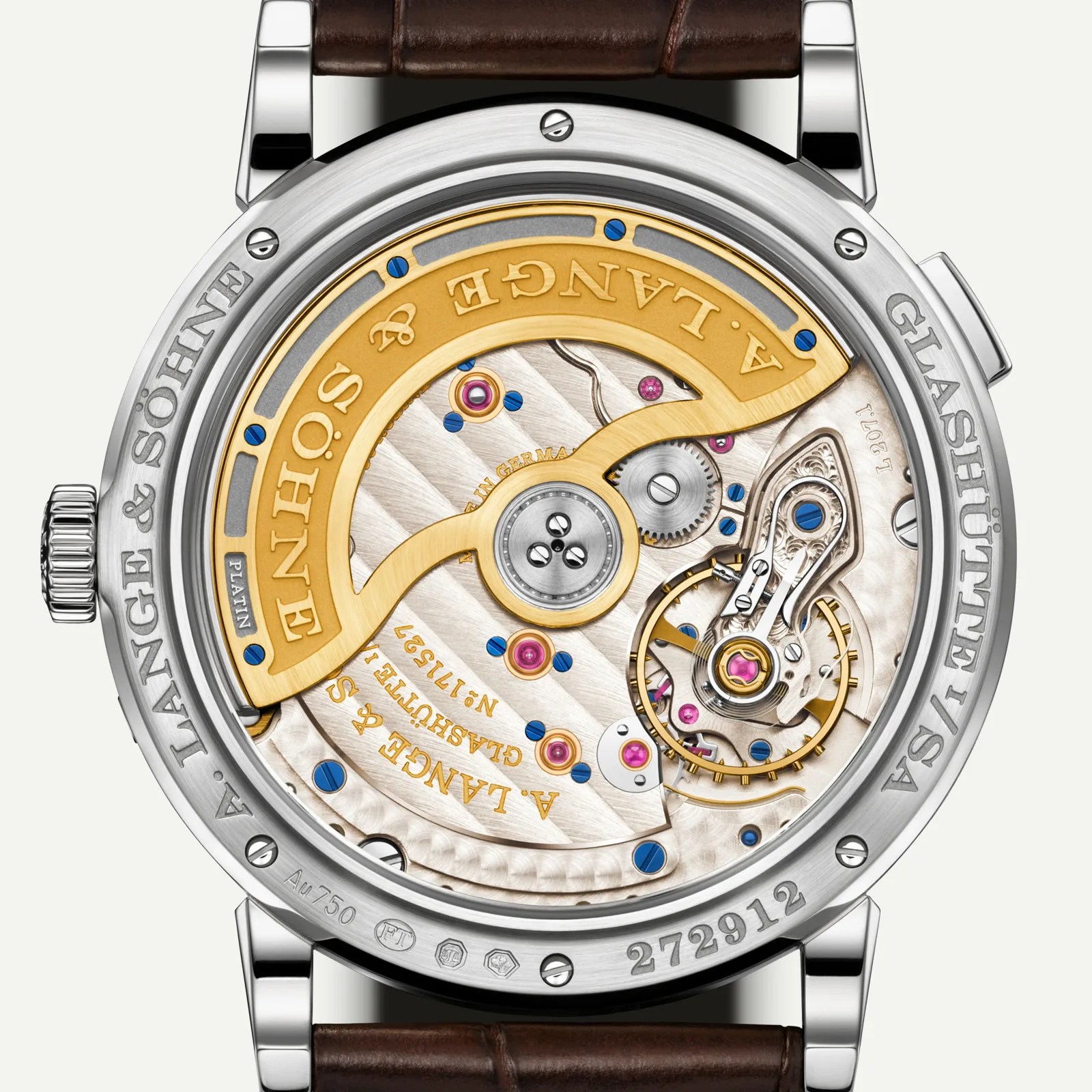 Close-up of the back of an A. Lange & Söhne mechanical watch showing intricate gold and silver gears, blue screws, and a brown leather strap.
