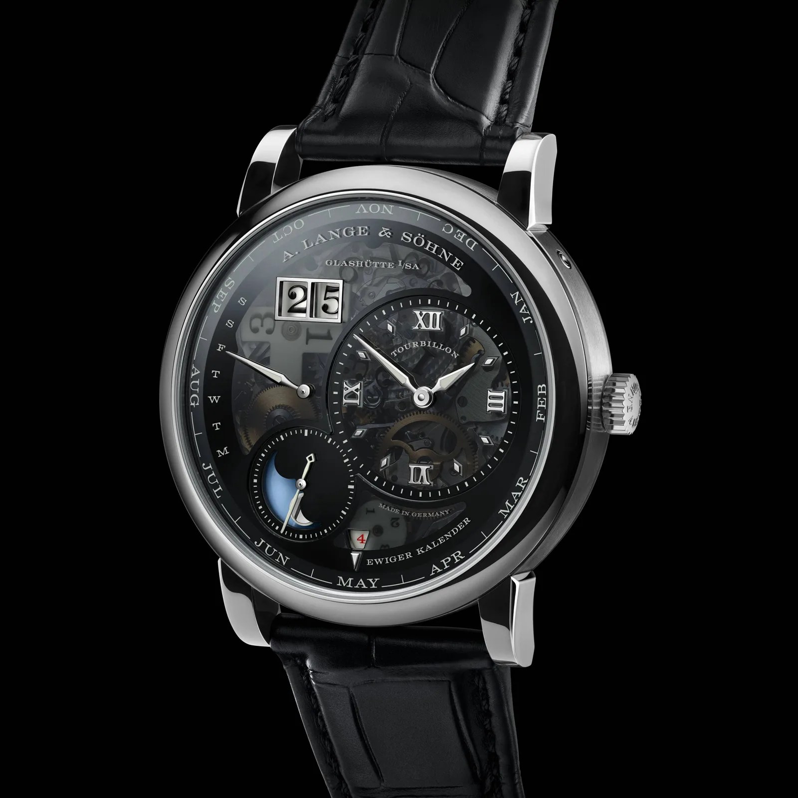 Silver A. Lange & S&ouml;hne wristwatch with black skeleton dial, moon phase, date display, and black leather strap.
