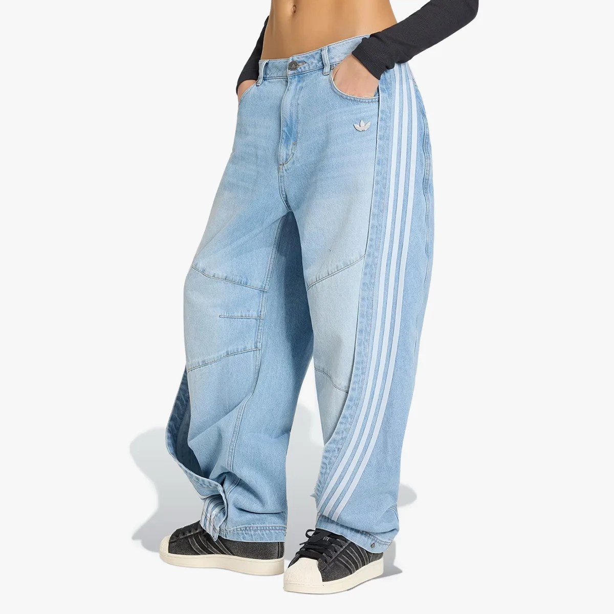 Light blue wide-leg denim jeans with white Adidas stripes down the sides and a small Adidas logo on the front pocket.