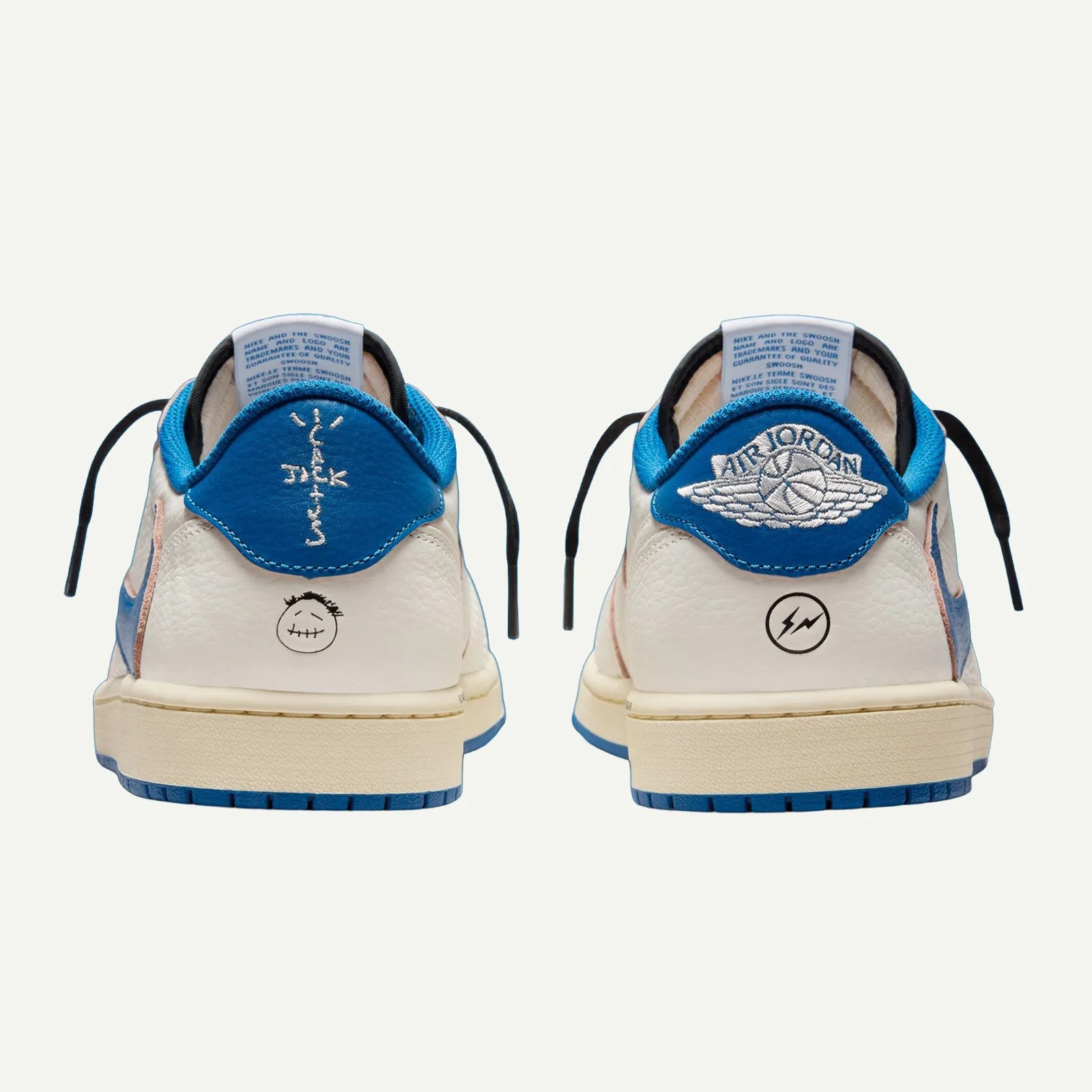 Pair of white and blue Air Jordan sneakers showing the back heel with embroidered logos and black laces.