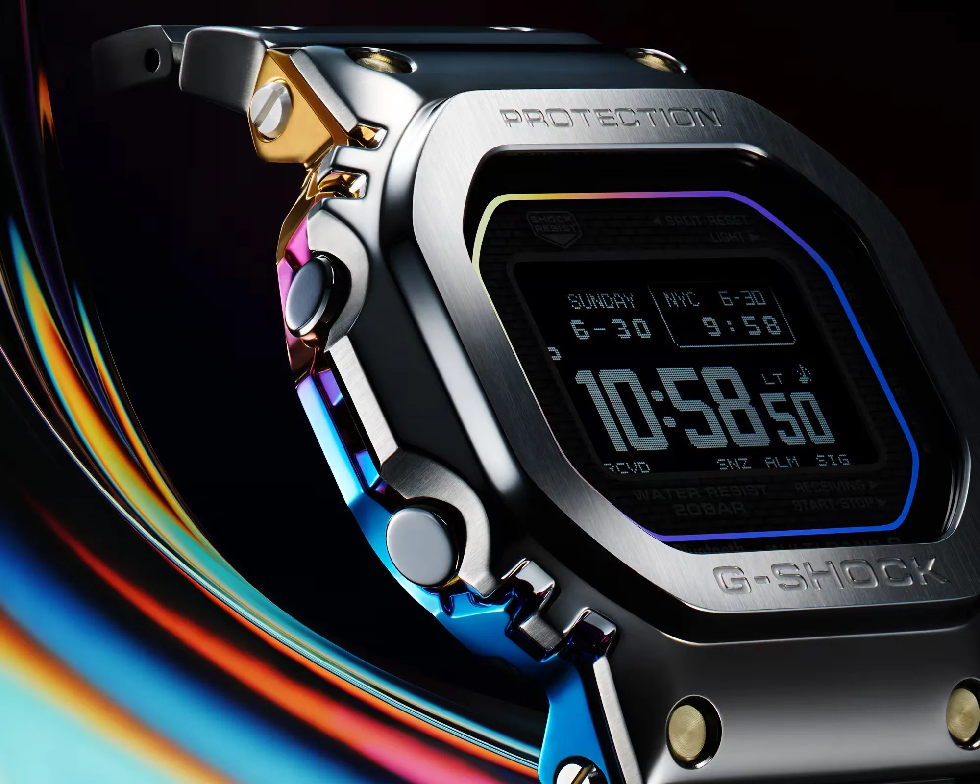 Close-up of a metallic G-Shock digital watch with a multicolor bezel and a black digital display.