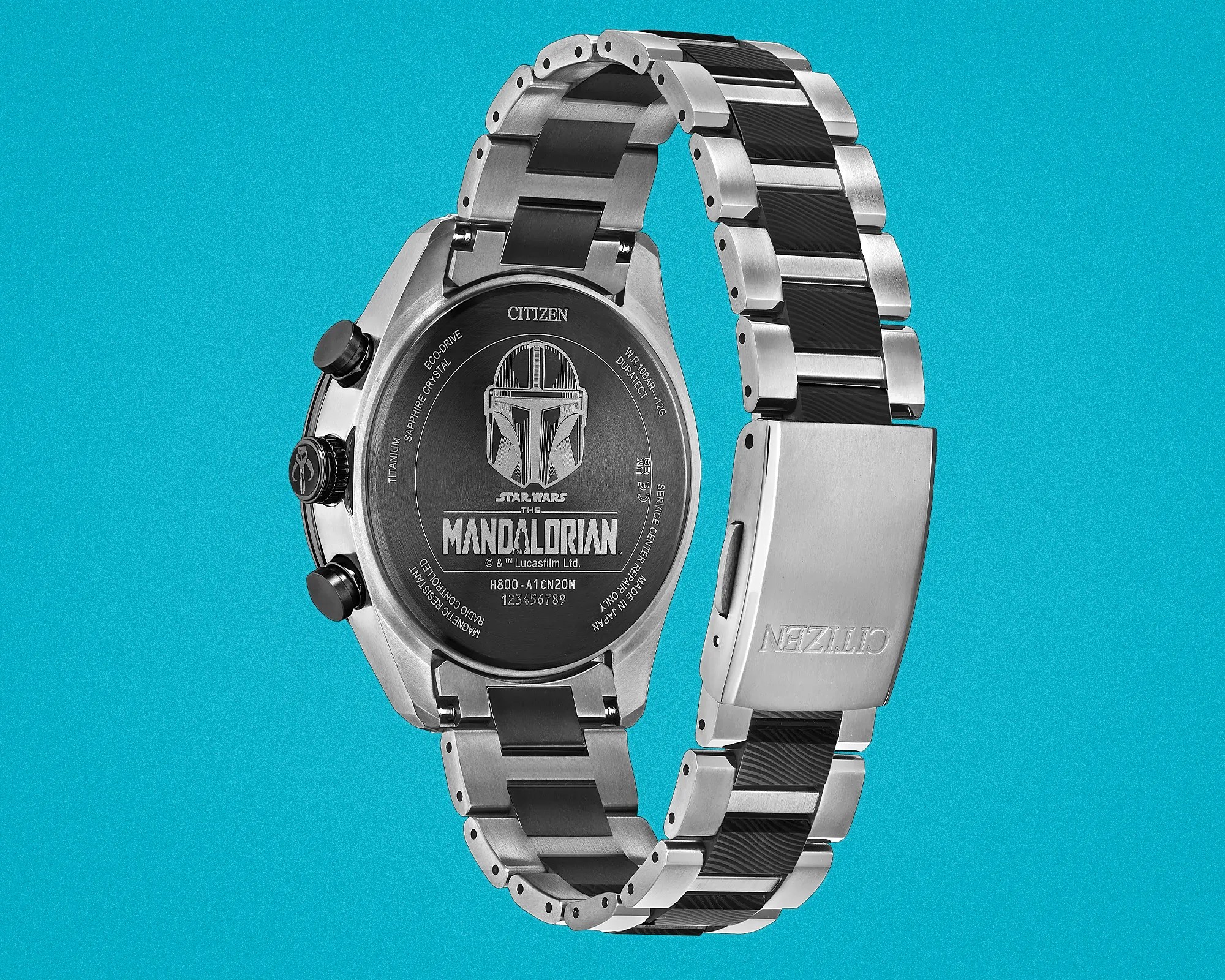 Back of a Citizen titanium wristwatch with black and silver metal band featuring The Mandalorian Star Wars engraving.