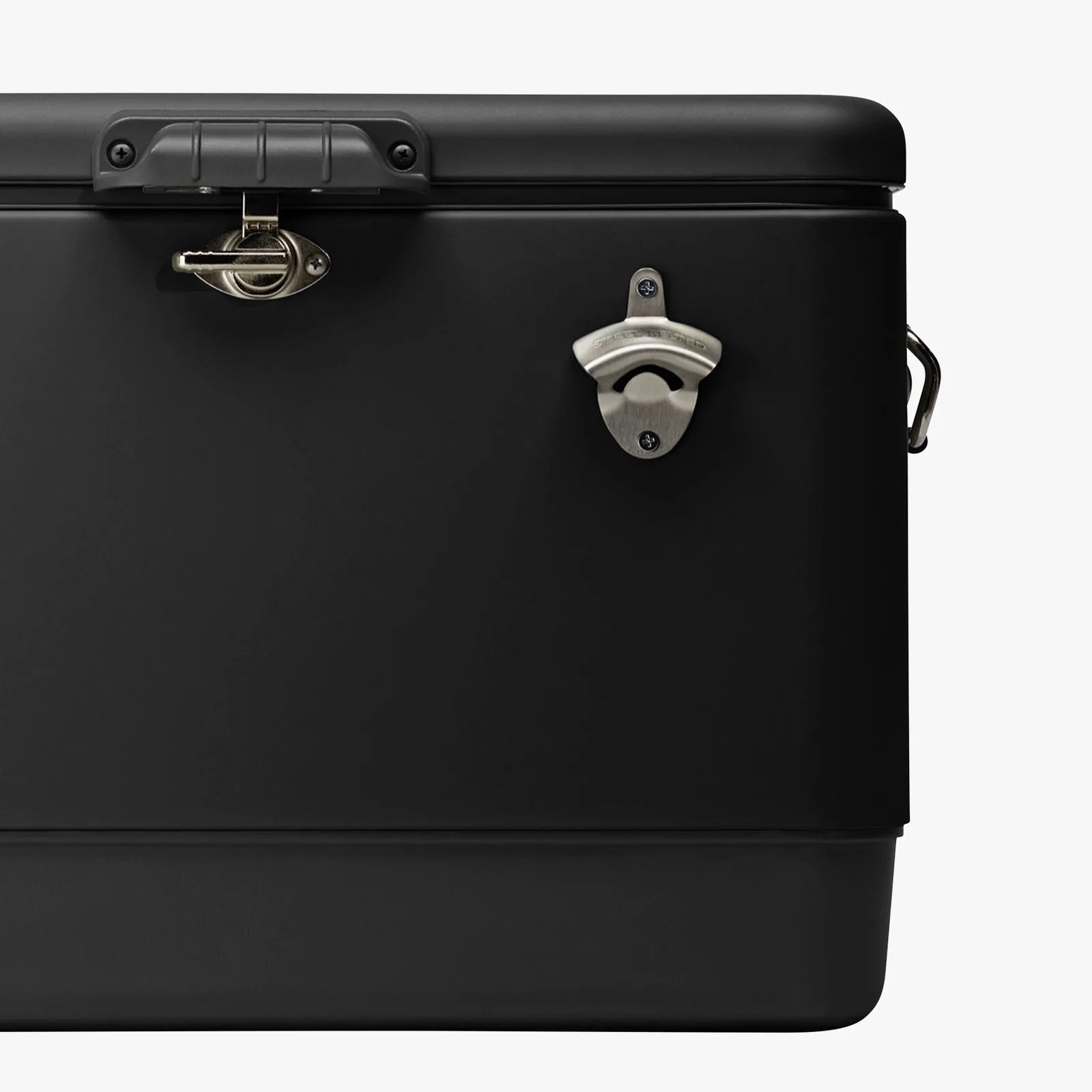 Black cooler with a metal latch and a silver wall-mounted bottle opener on the front.