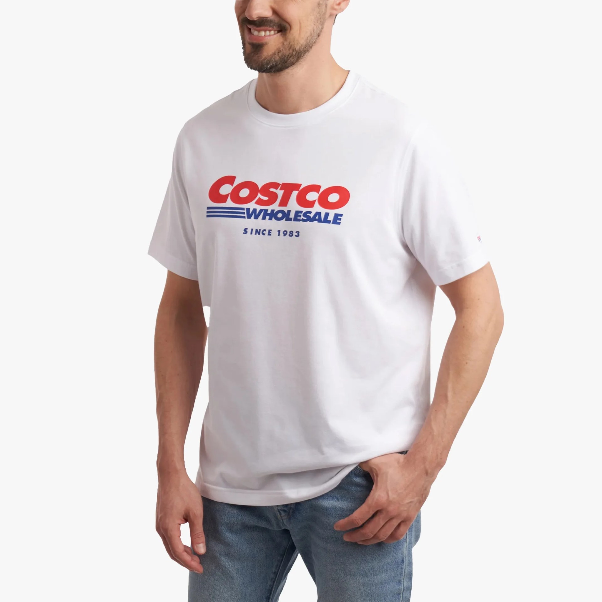 White short-sleeve T-shirt with red and blue "Costco Wholesale Since 1983" logo worn by a person.