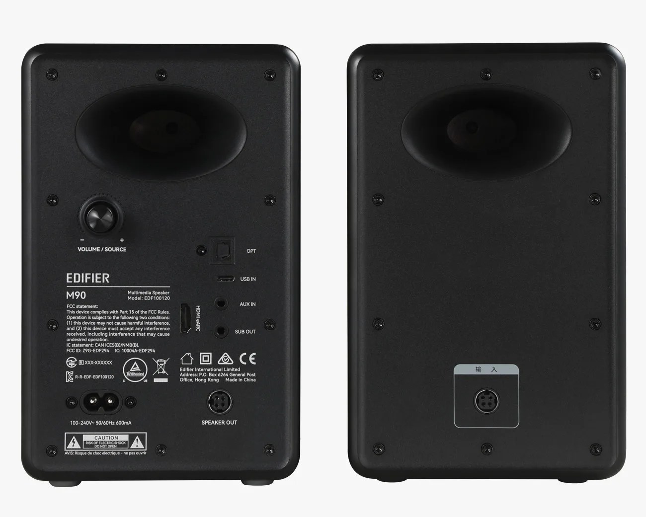 Back view of two black Edifier M90 multimedia speakers showing volume knob, various input/output ports, and speaker connection.