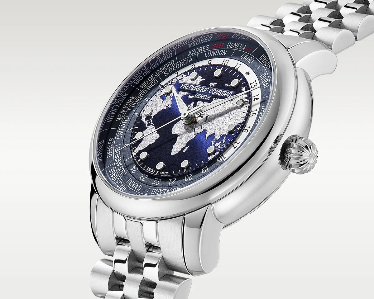 Silver Frederique Constant wristwatch with a blue world map dial and city names around the bezel.