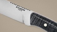 Close-up of a Filson knife blade with a black textured handle and the text "3 of 30" on the blade.