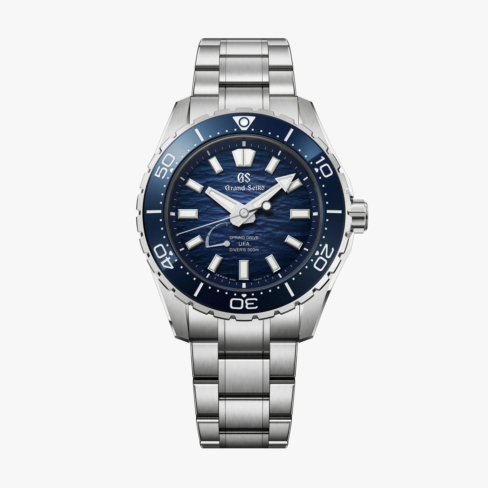 Stainless steel Grand Seiko diver's watch with blue textured dial and rotating bezel.