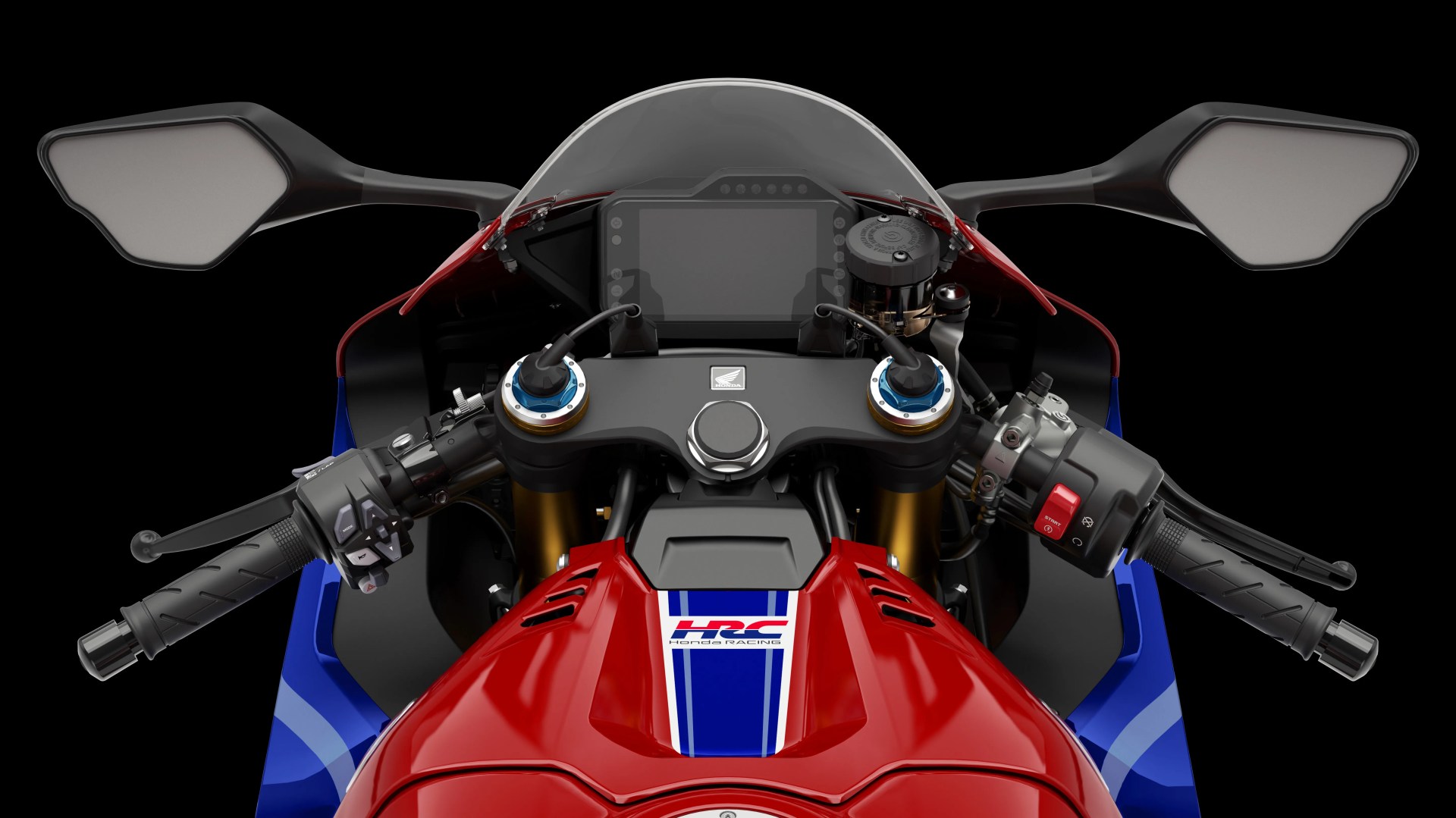 Close-up of a red and blue Honda Racing motorcycle dashboard with black handlebars, mirrors, and digital display.
