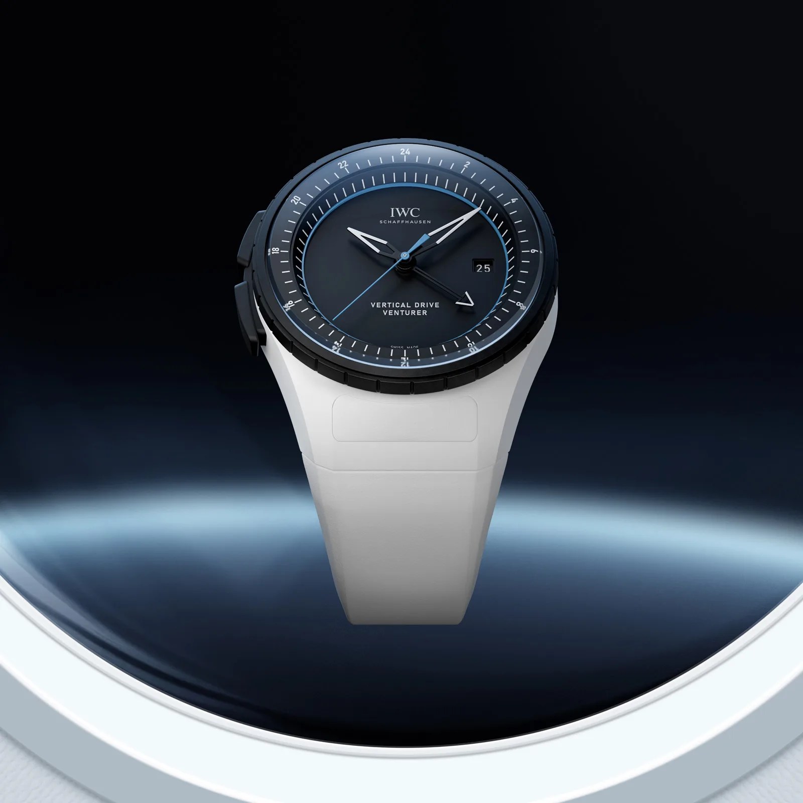 Black dial IWC Schaffhausen Vertical Drive Venturer watch with white strap against a dark background.
