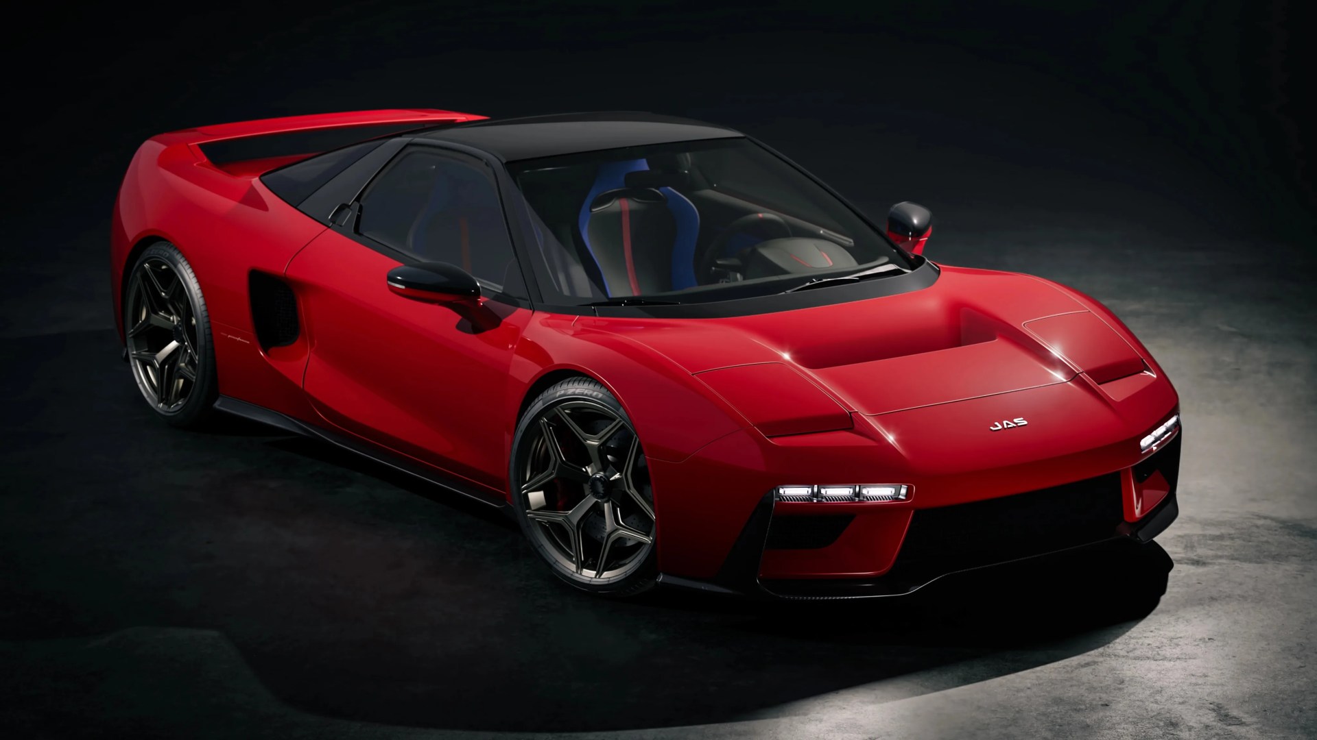 Red sports car with black roof and blue racing seats in a dark studio setting.