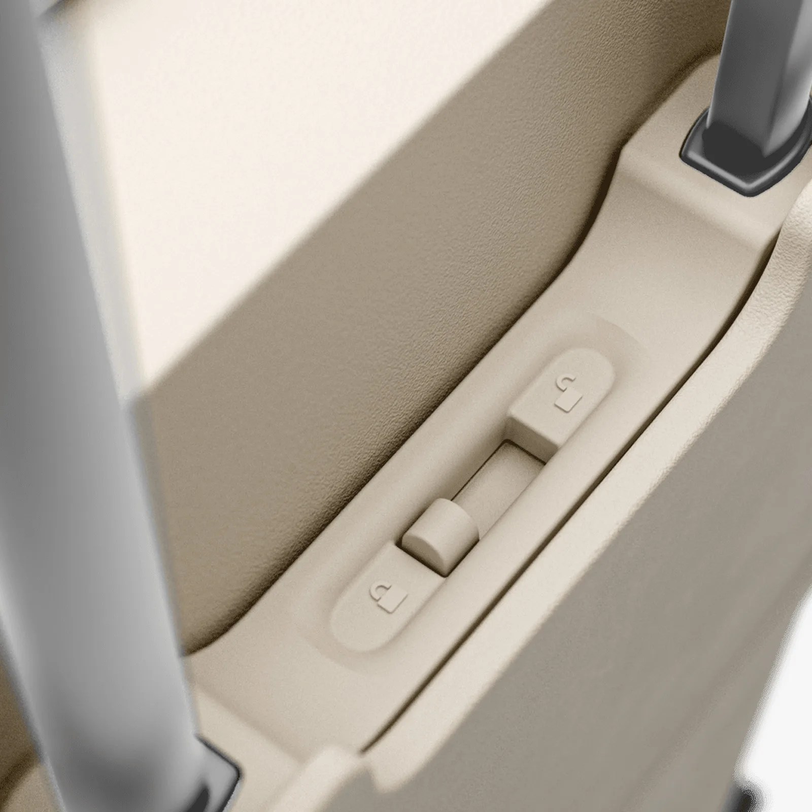 Beige car door panel with lock and unlock buttons and a door handle.