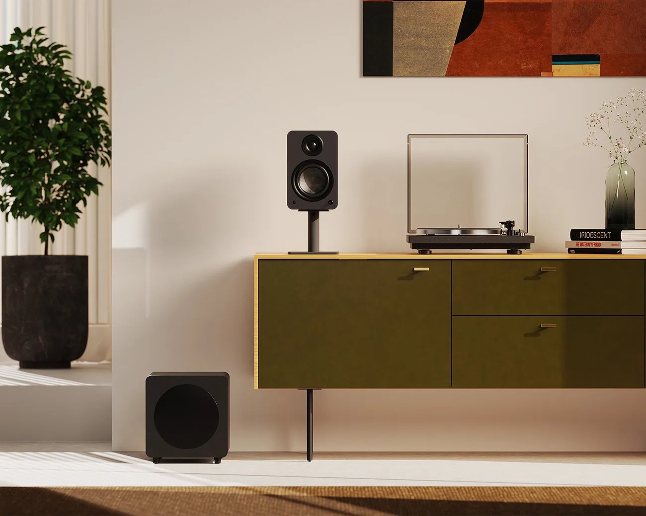 Black bookshelf speaker on a stand and black subwoofer next to an olive green cabinet with a turntable and books on top.