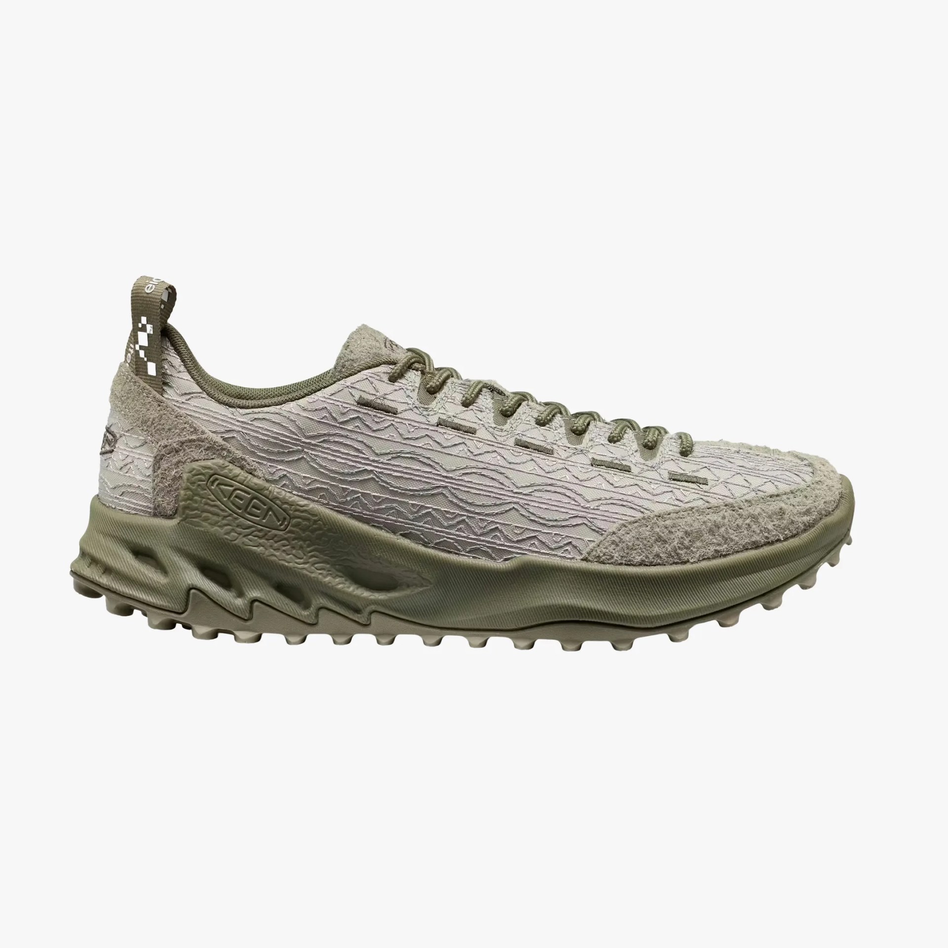 Light olive green and beige trail running shoe with textured upper and rugged sole.