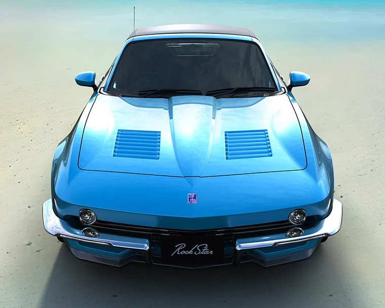 Shiny blue vintage sports car with dual hood vents and chrome bumpers viewed from the front.