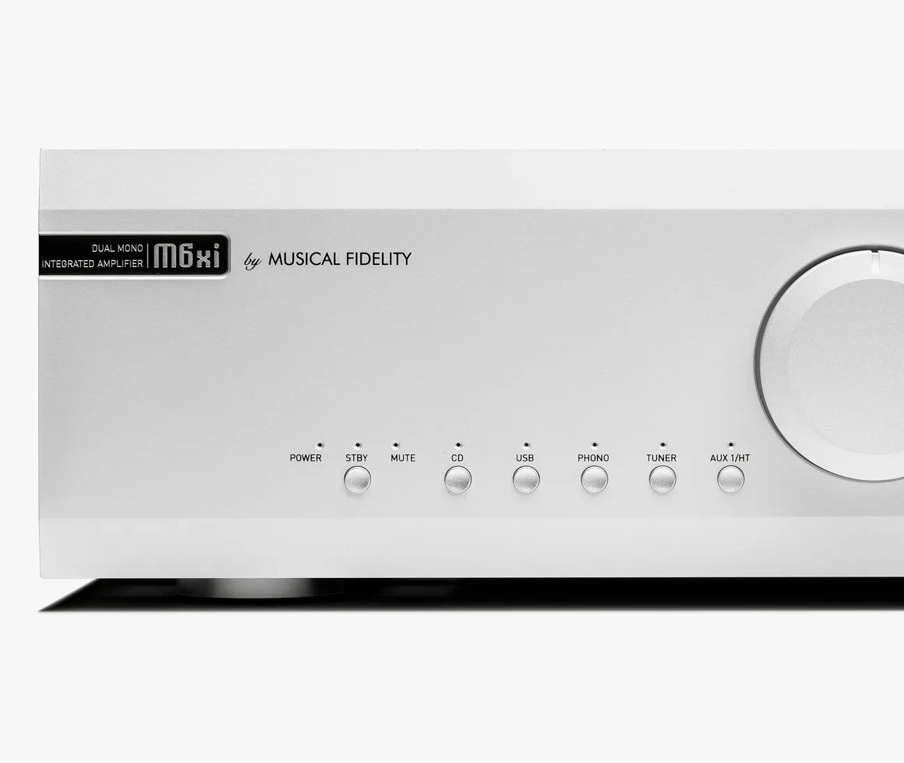 Silver Musical Fidelity M6xi dual mono integrated amplifier with multiple input buttons and a large volume knob.