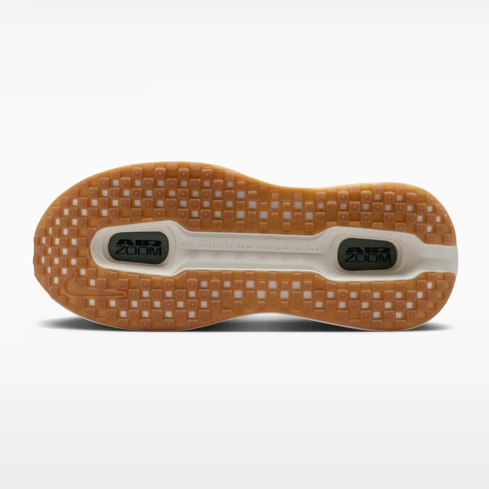 Gum rubber outsole with square tread pattern and black "Air Zoom" cushioning units.