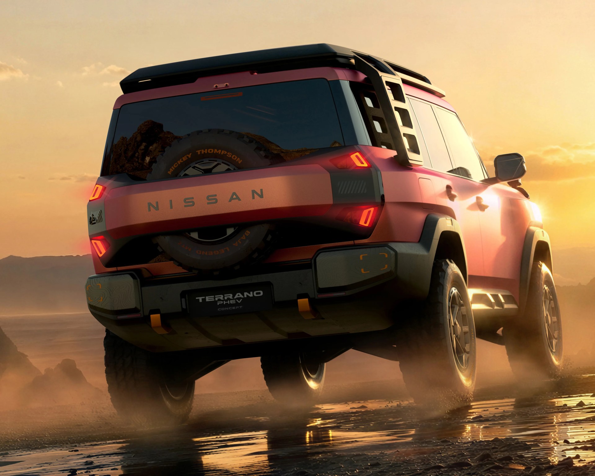 Red Nissan Terrano PHEV concept SUV driving off-road at sunset with spare tire mounted on rear door.
