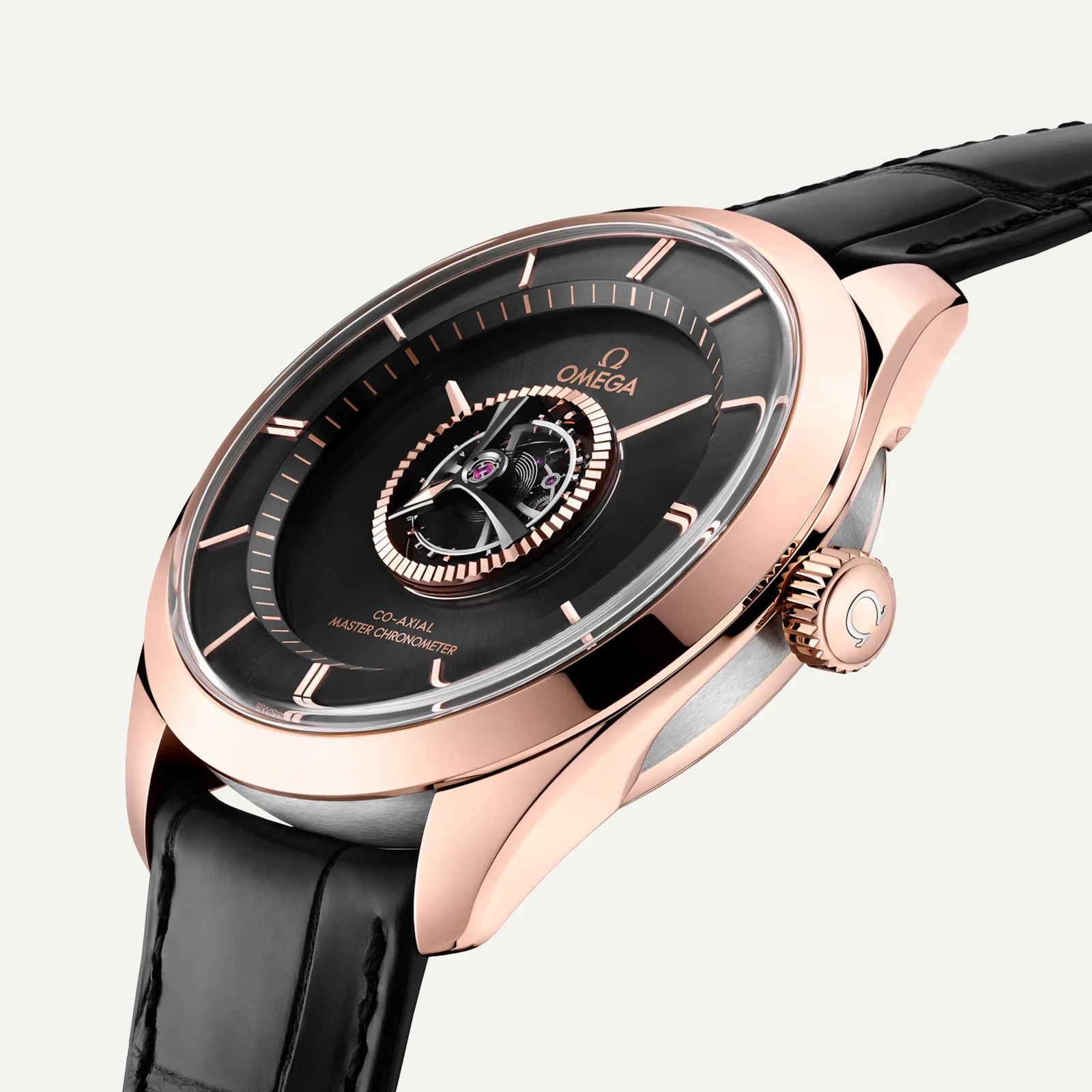Rose gold Omega wristwatch with black dial, visible tourbillon, and black leather strap.