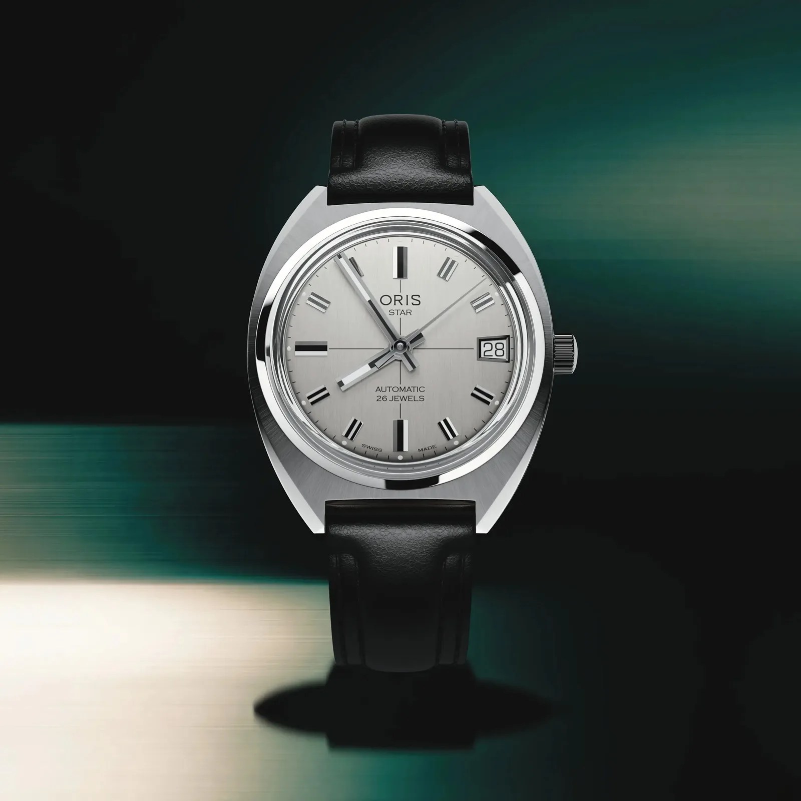 Silver Oris Star automatic wristwatch with black leather strap and date display at 3 o'clock.