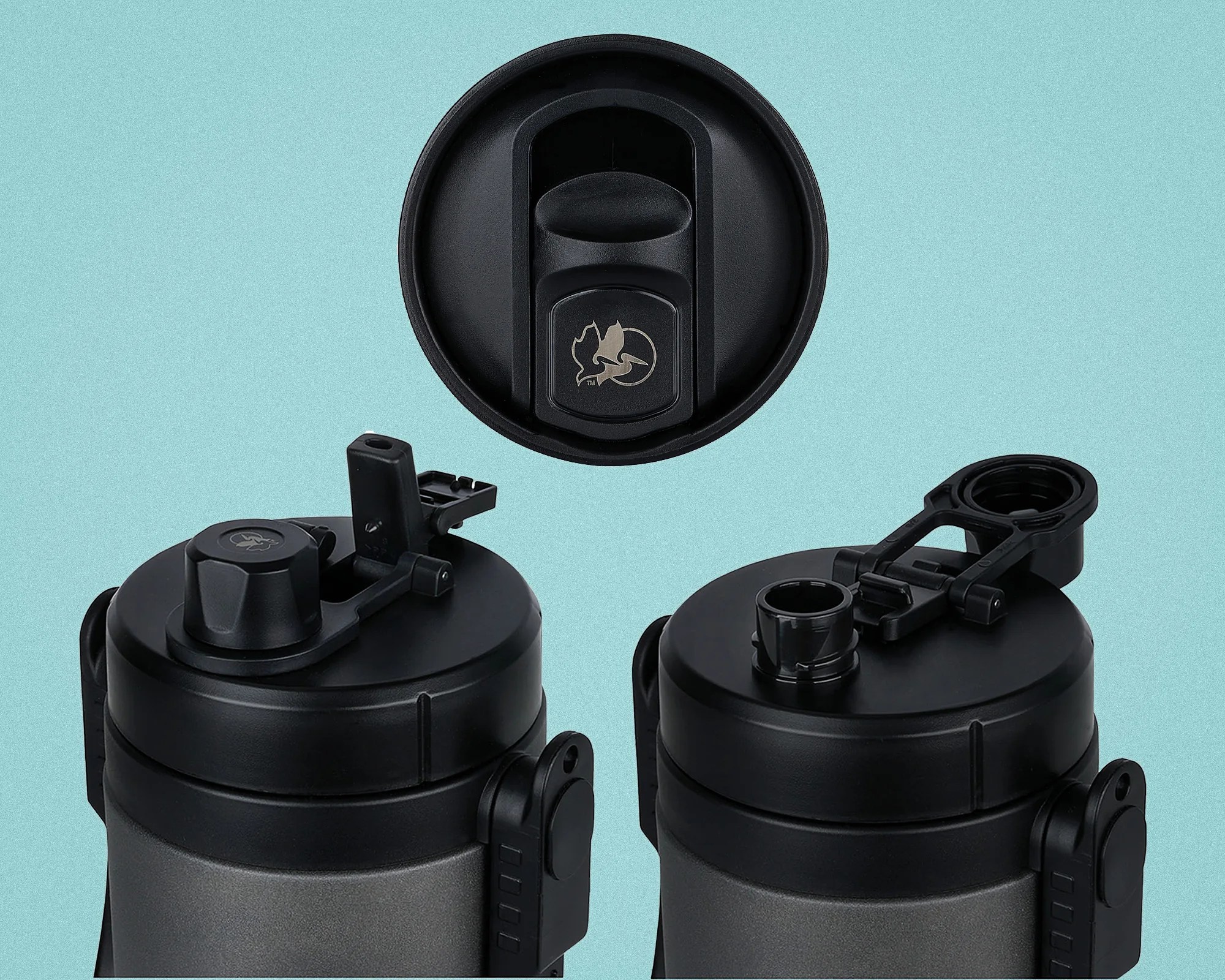 Black plastic lids with flip-top spouts and a locking mechanism, shown on a gray container against a light blue background.