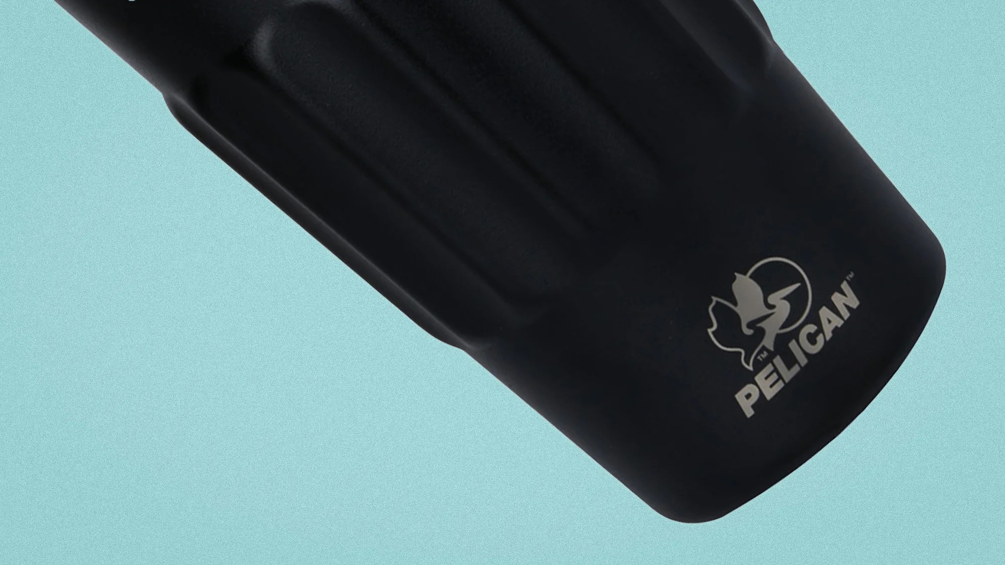 Black Pelican-branded protective case with a textured surface on a light blue background.