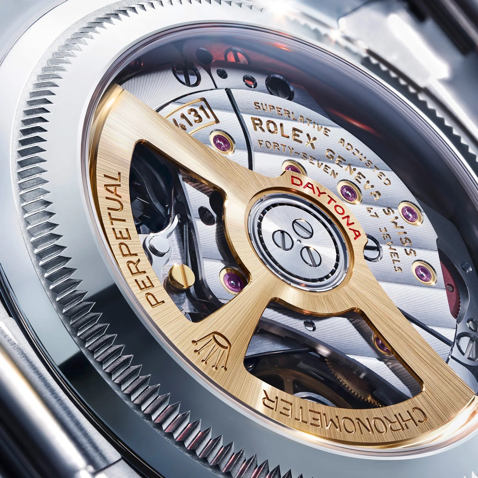 Close-up of a Rolex Daytona watch movement with gold rotor and visible jewels inside a stainless steel case.