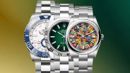 Three Rolex watches with stainless steel bracelets, featuring a white and blue Yacht-Master II, a green Datejust with a fluted bezel, and a colorful patterned Oyster Perpetual.