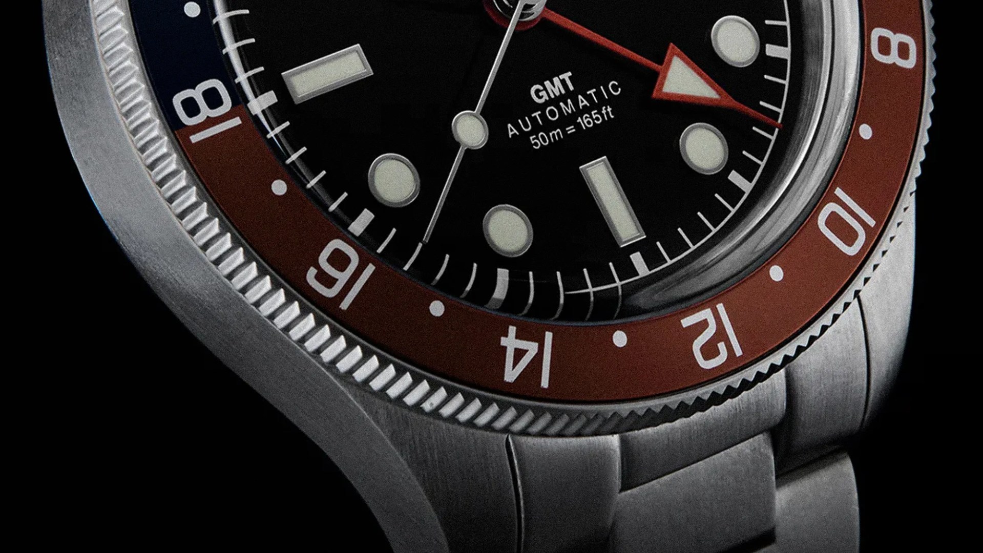 Timex Borrows Iconic Rolex Styling For an Affordable Automatic GMT Travel Watch