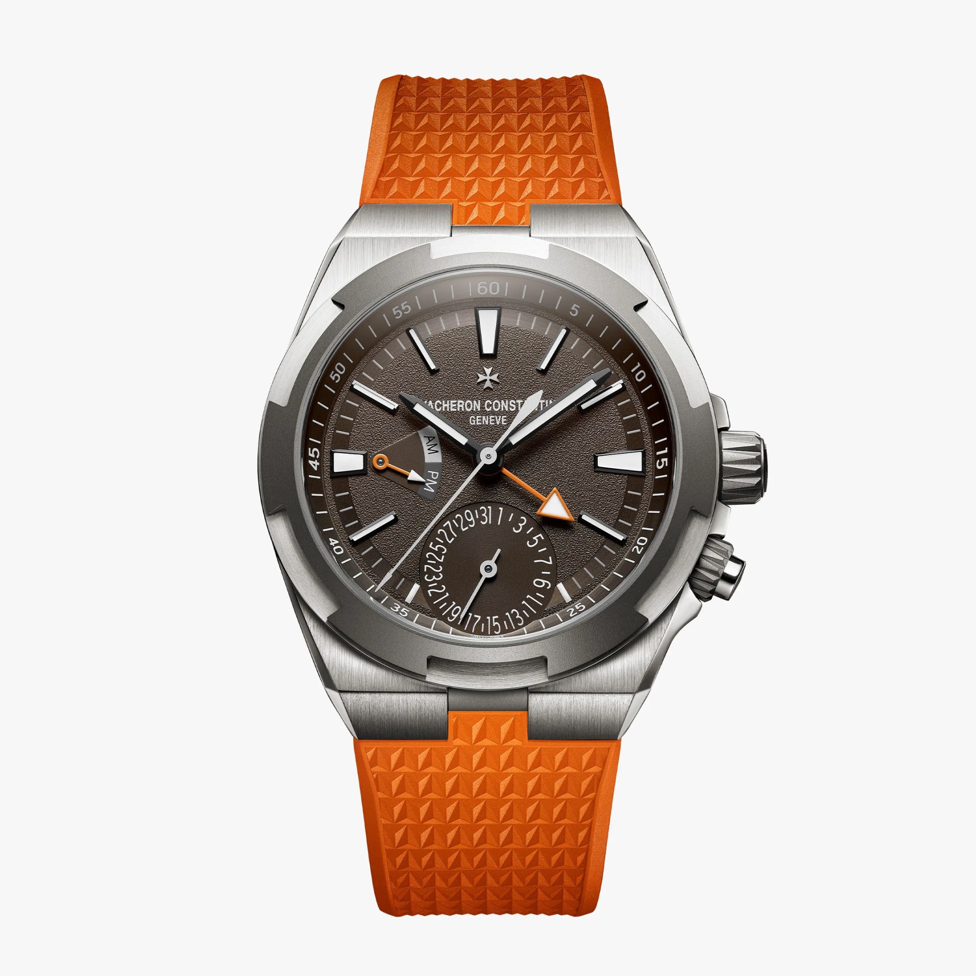 Titanium wristwatch with textured brown dial, orange rubber strap, and multiple subdials including date and AM/PM indicators.