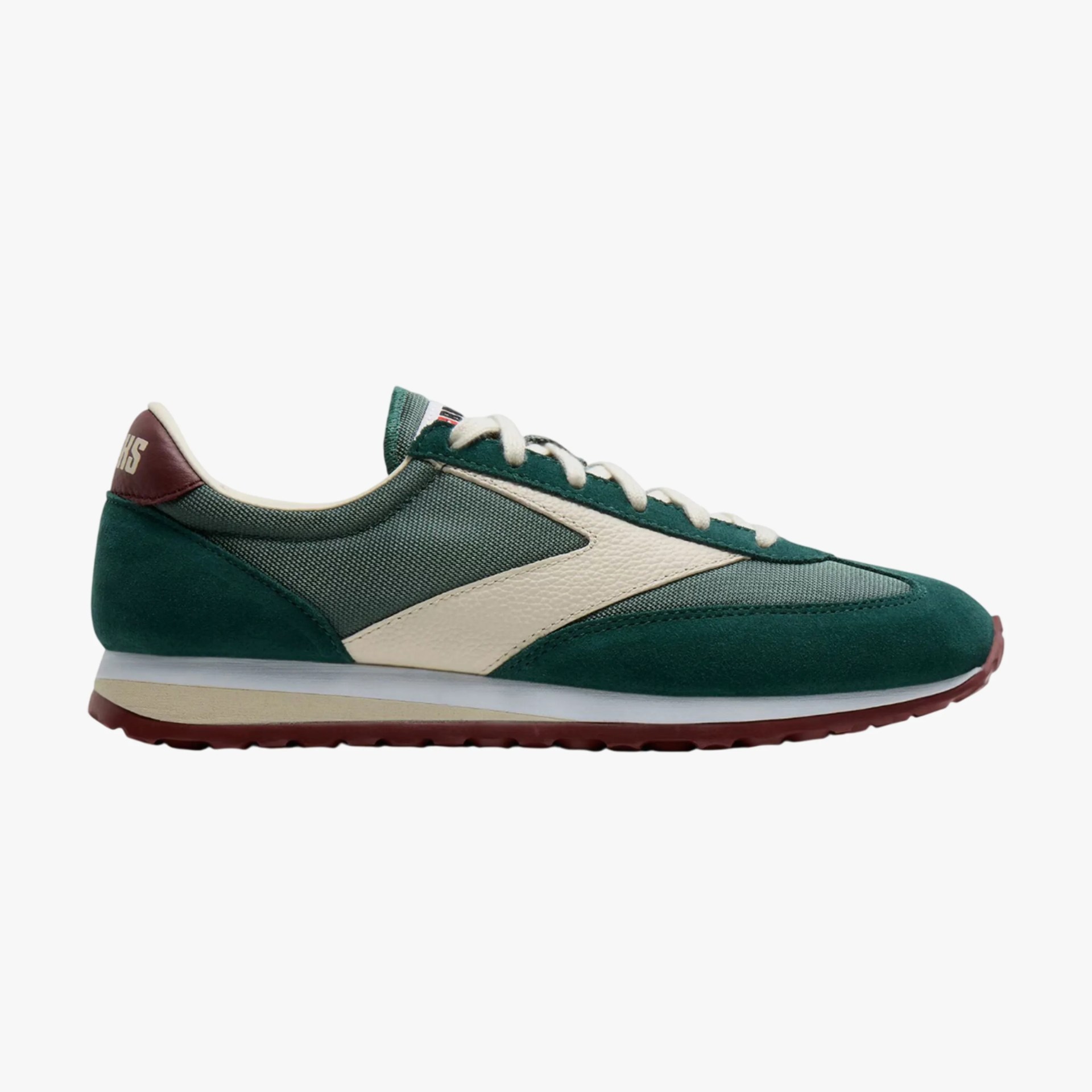 Green and beige suede and mesh sneaker with white laces and brown sole viewed from the side.